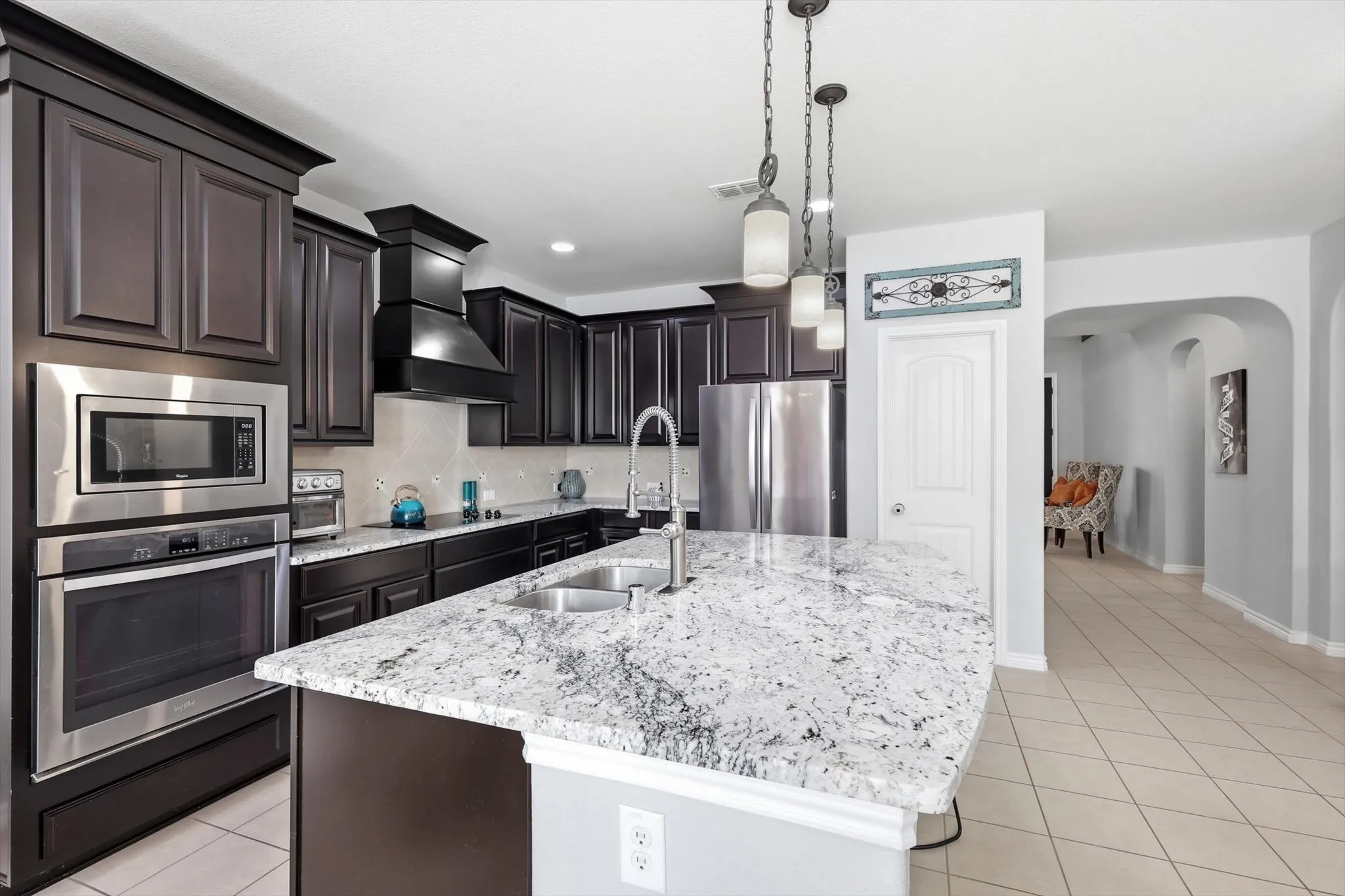 Stainless steel appliances and decorative lighting