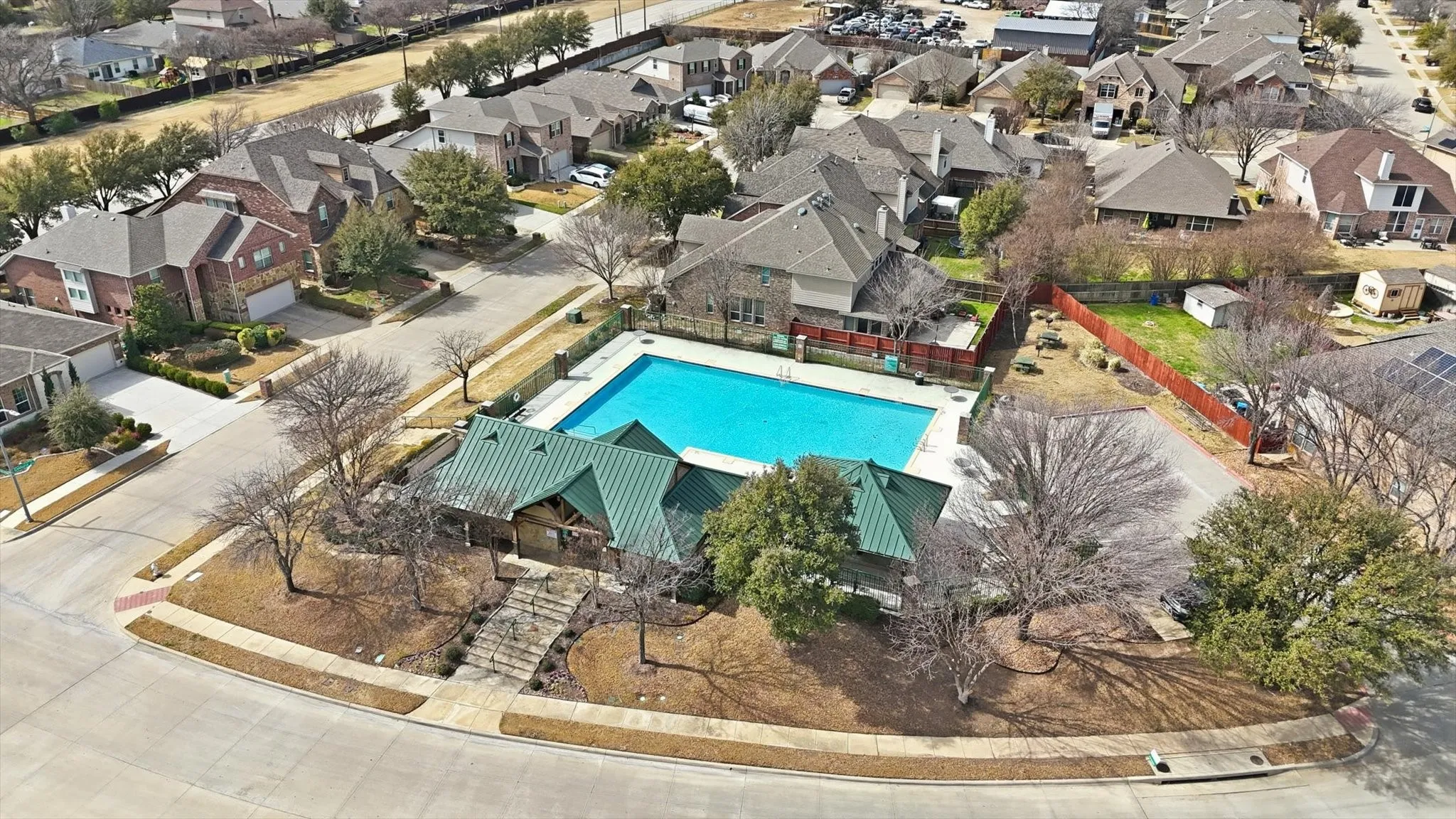 With a large community pool and clubhouse