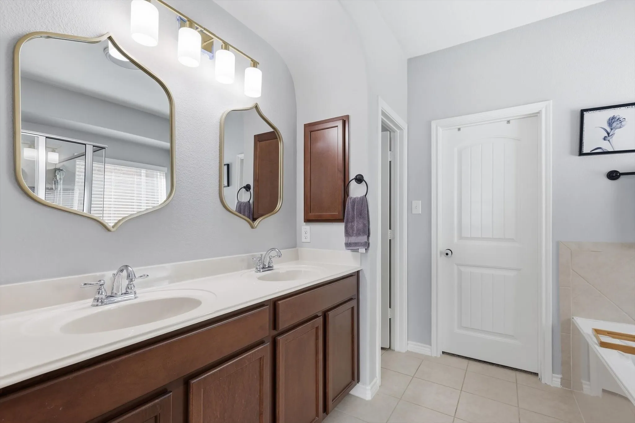 Dual sinks. Lots of light. Specious too.