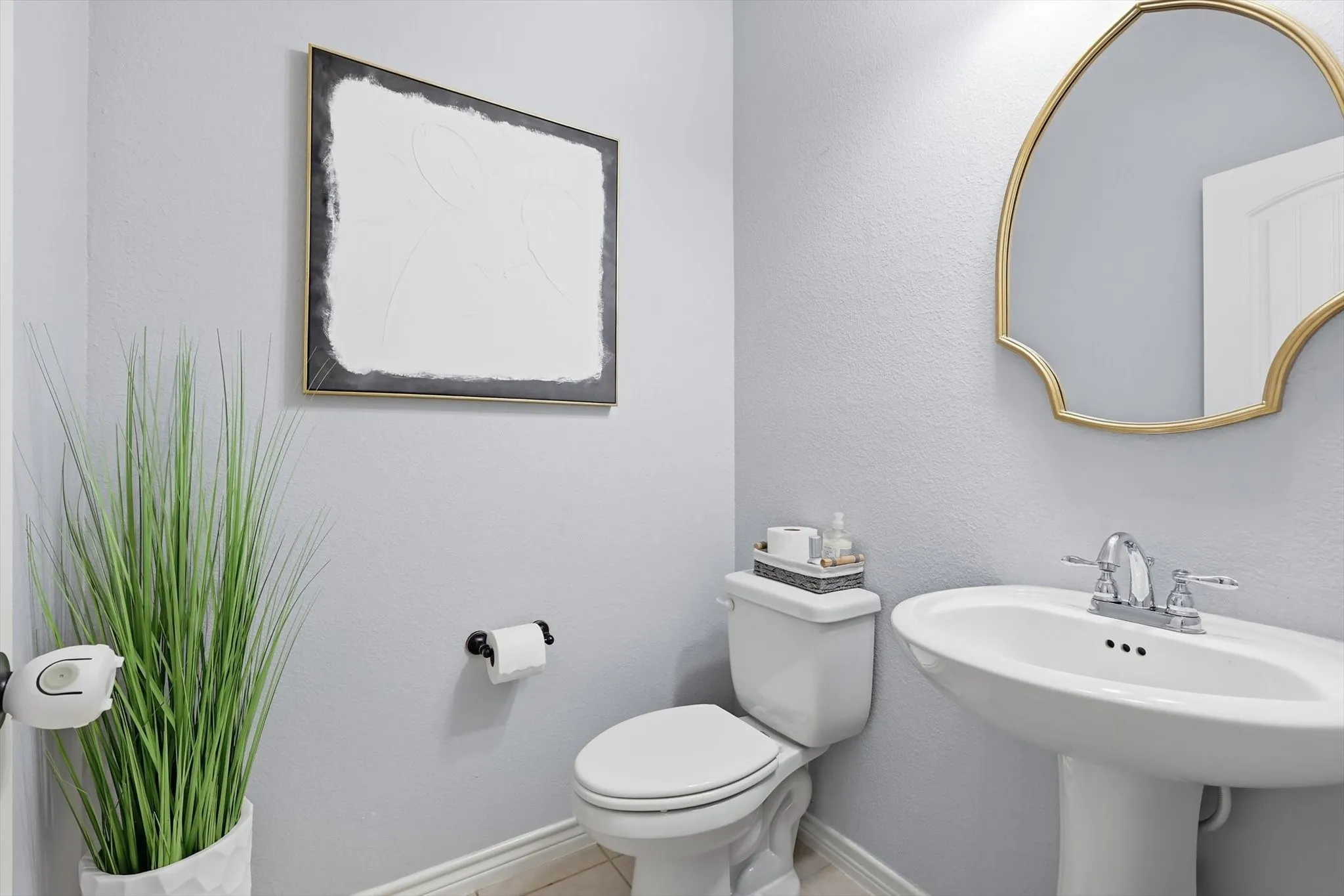 A well placed half bath . Light and bight