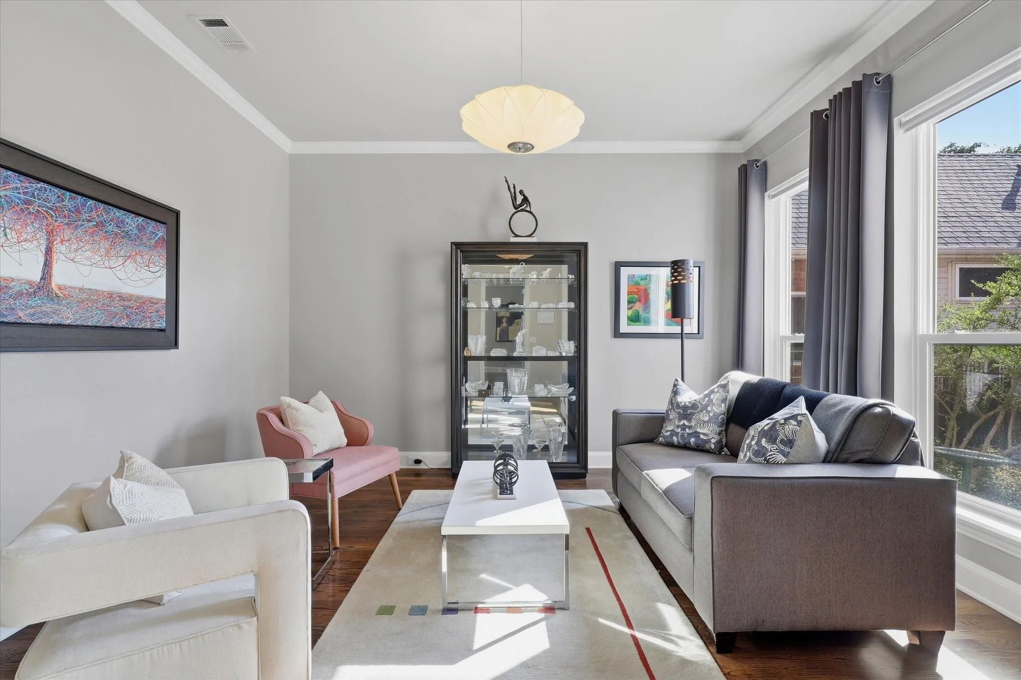 Just off the foyer, the formal living room offers versatility as an additional gathering area, dining room or home office.