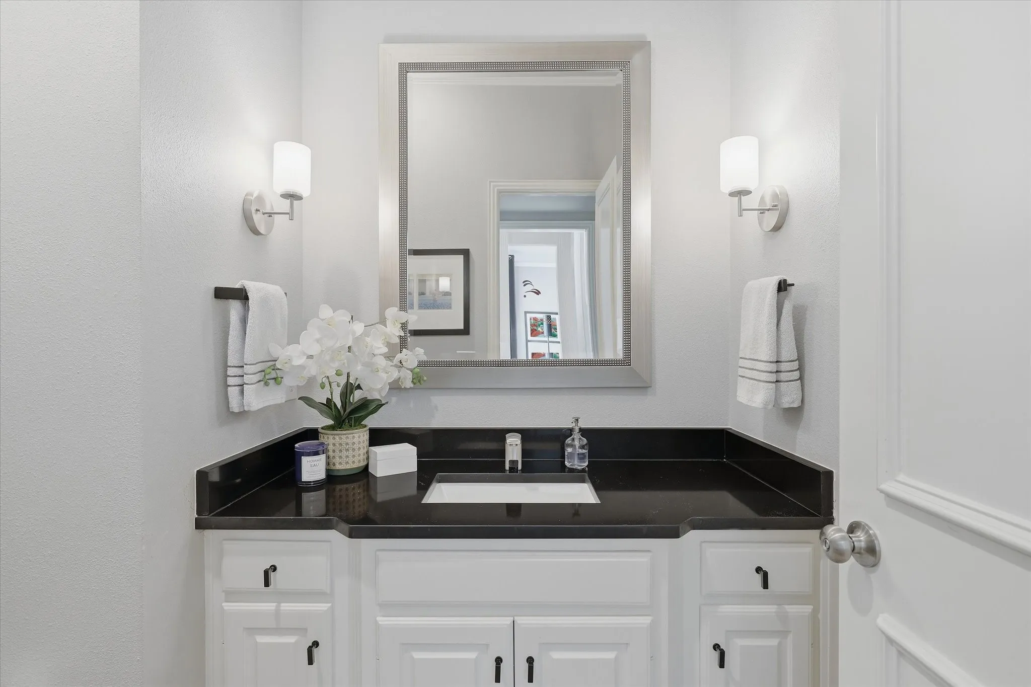 Powder bath finishes out the first floor.