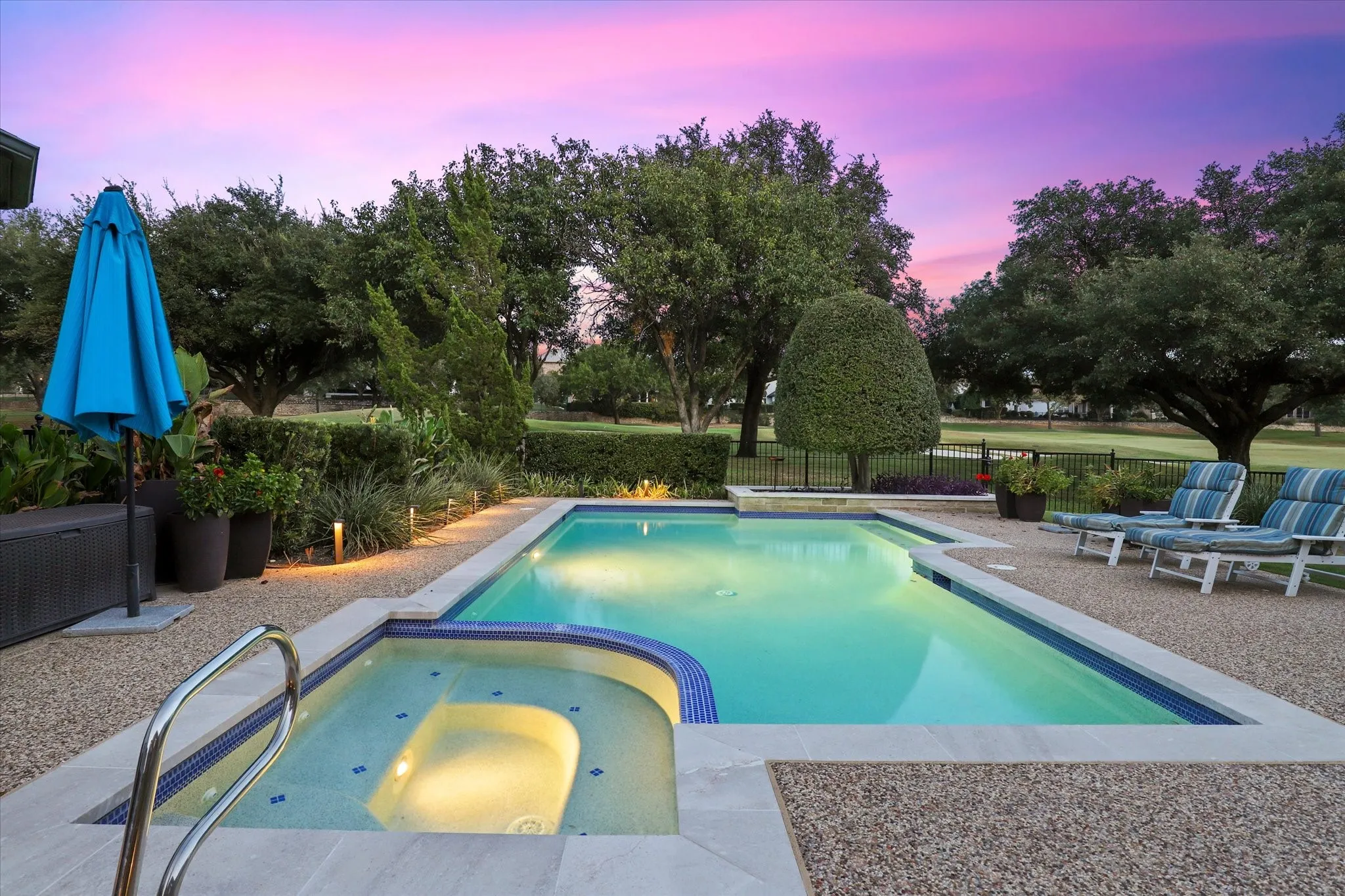 Panoramic golf course views and the sparkling pool and spa set the stage for relaxed outdoor living.