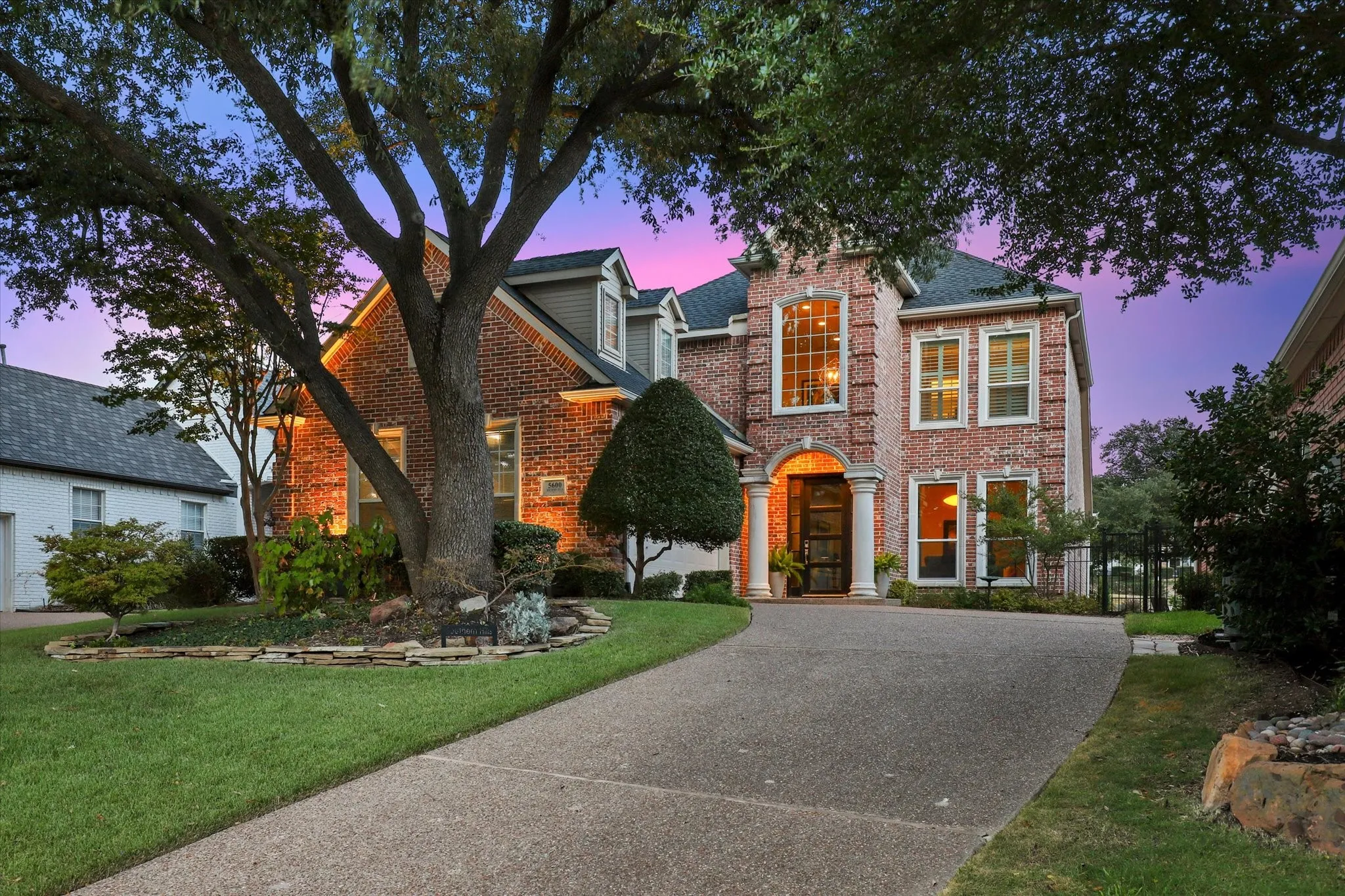 Framed by mature trees and overlooking the fourth green of Stonebriar Country Club, 5600 Southern Hills blends classic architecture with bright, inviting interiors in the coveted, gated and guarded community of Stonebriar Village.