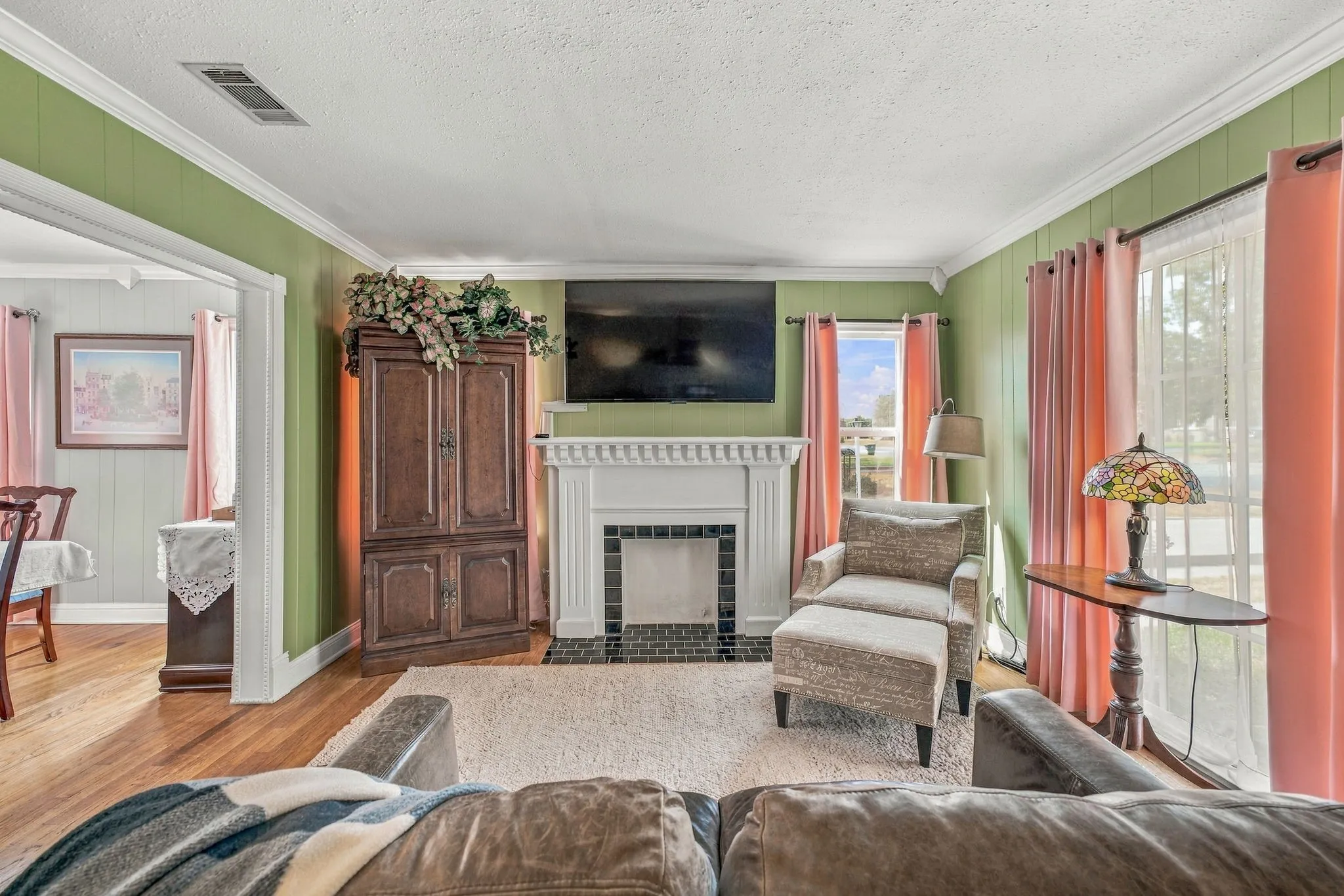 Living room with original hardwood floors.