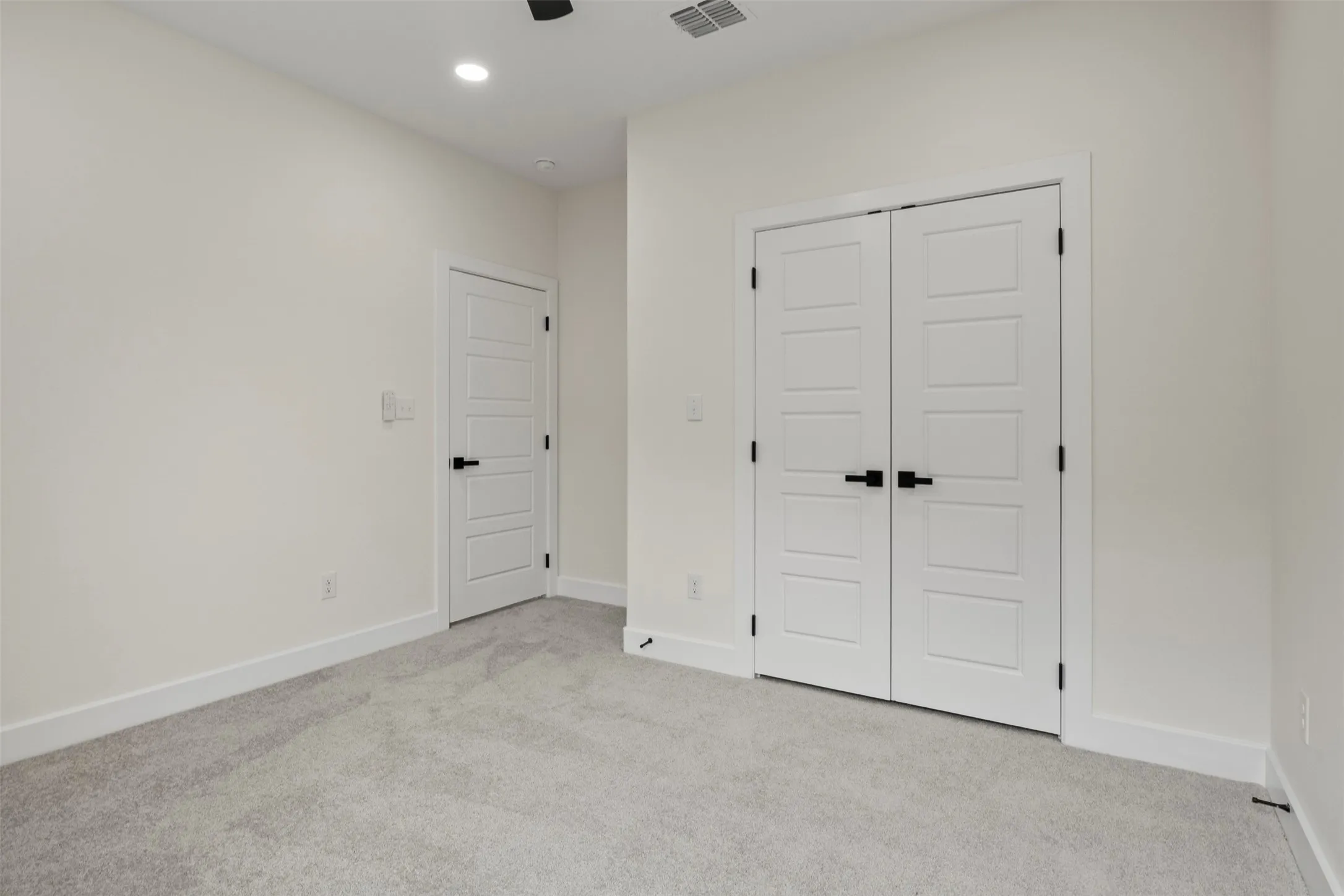Light gray carpeted flooring