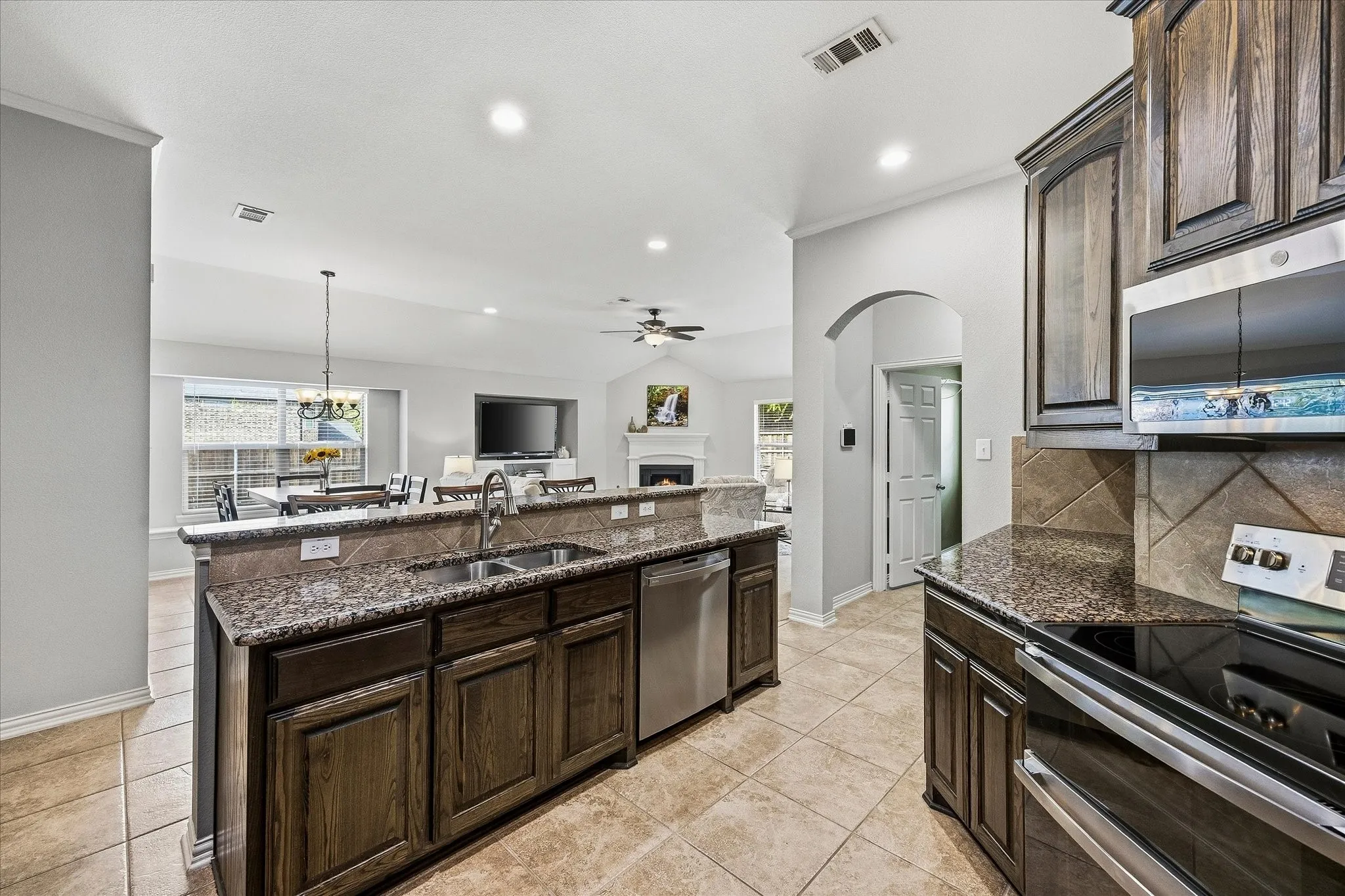 Kitchen opens onto breakfast area and family​​‌​​​​‌​​‌‌​‌‌​​​‌‌​‌​‌​‌​​​‌​​ room