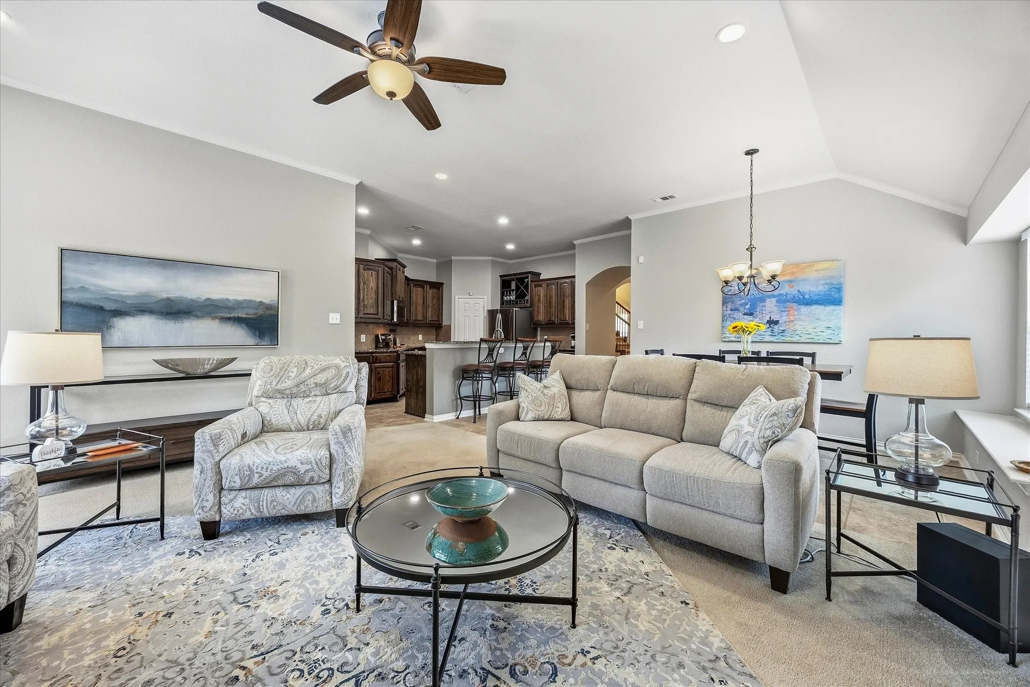 Stunning family room overlooks kitchen and breakfast area