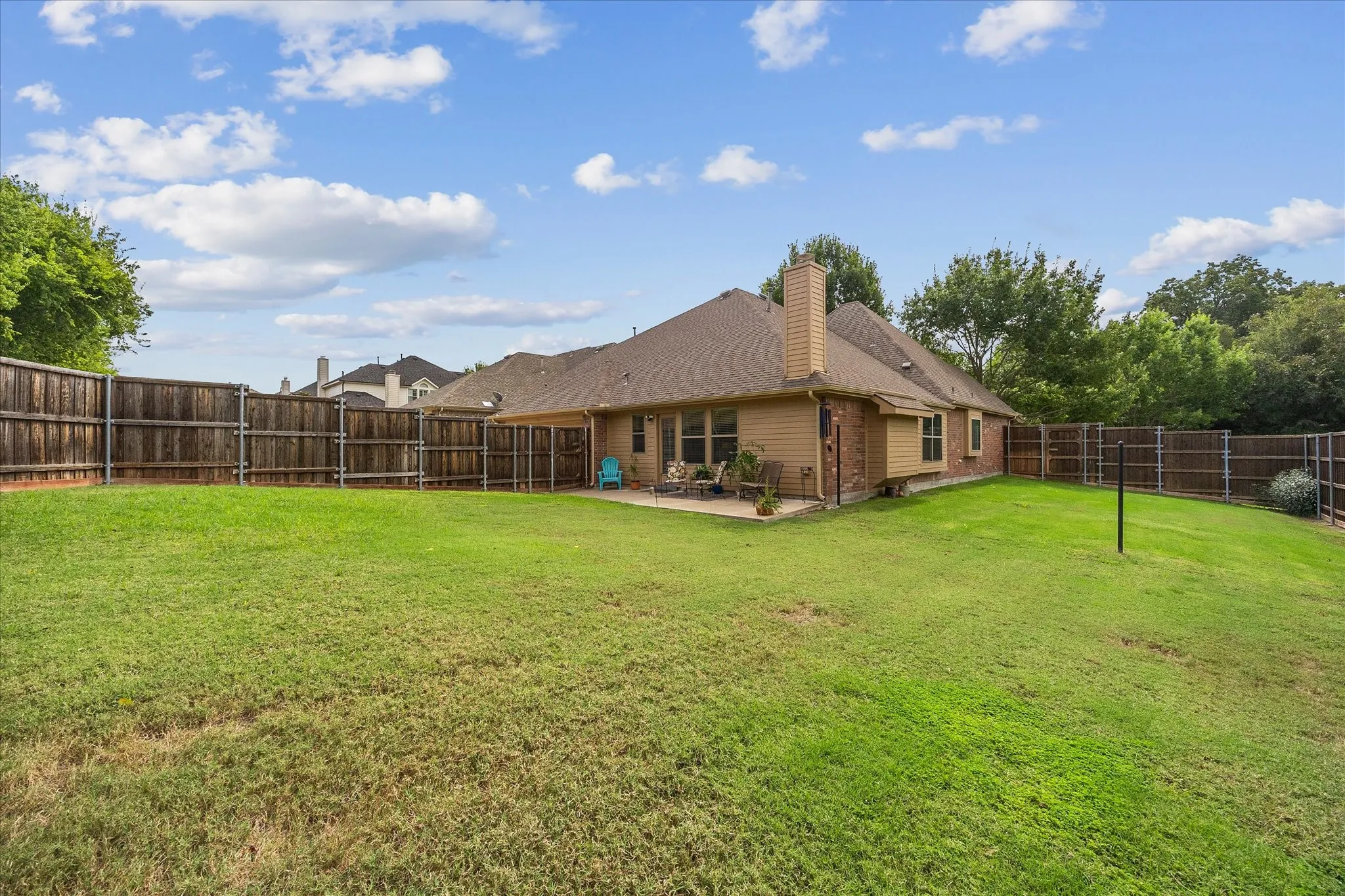 Ample room for your pool or playground here!