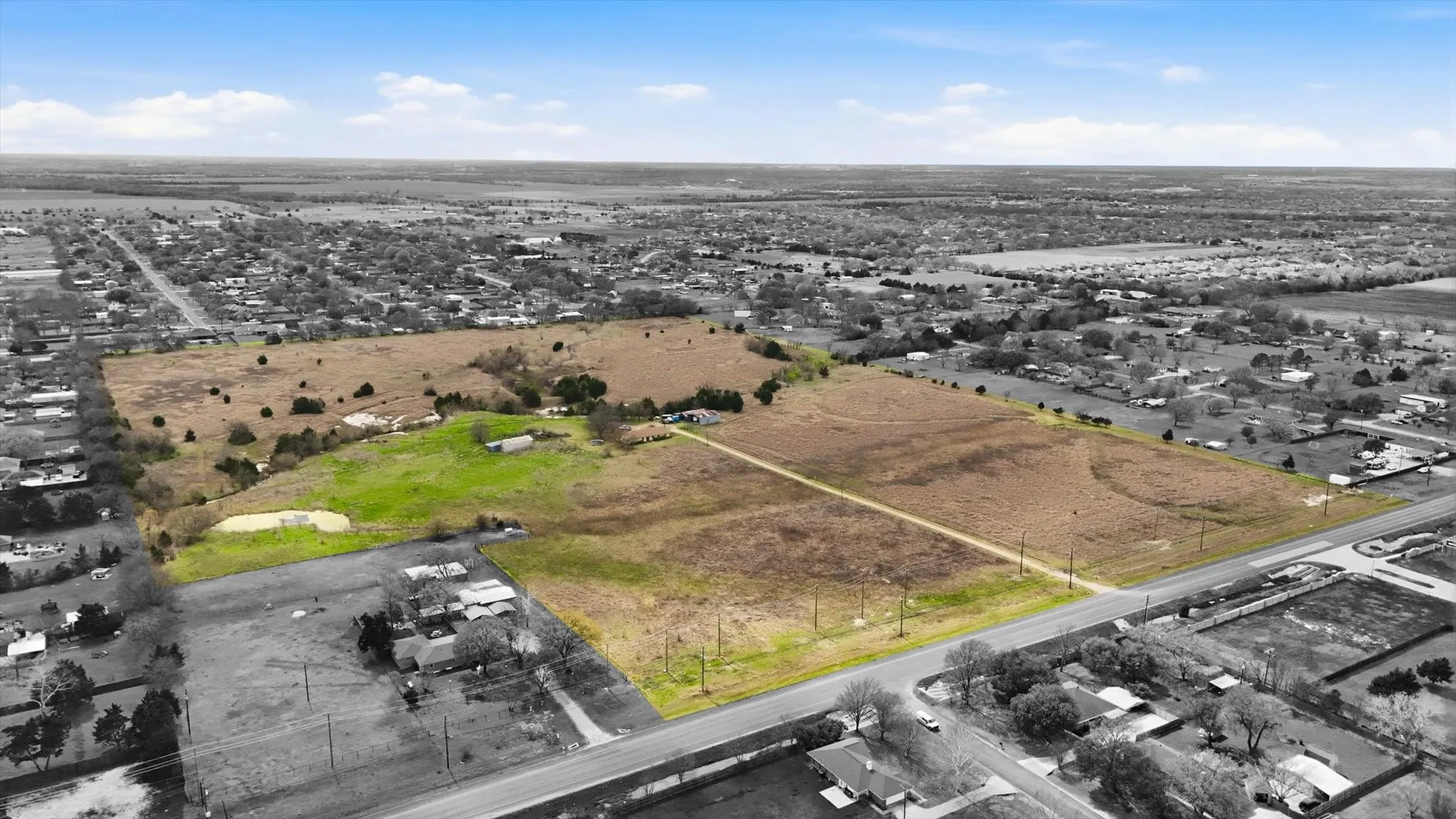 Overview of rural landscape with property parcel outlined