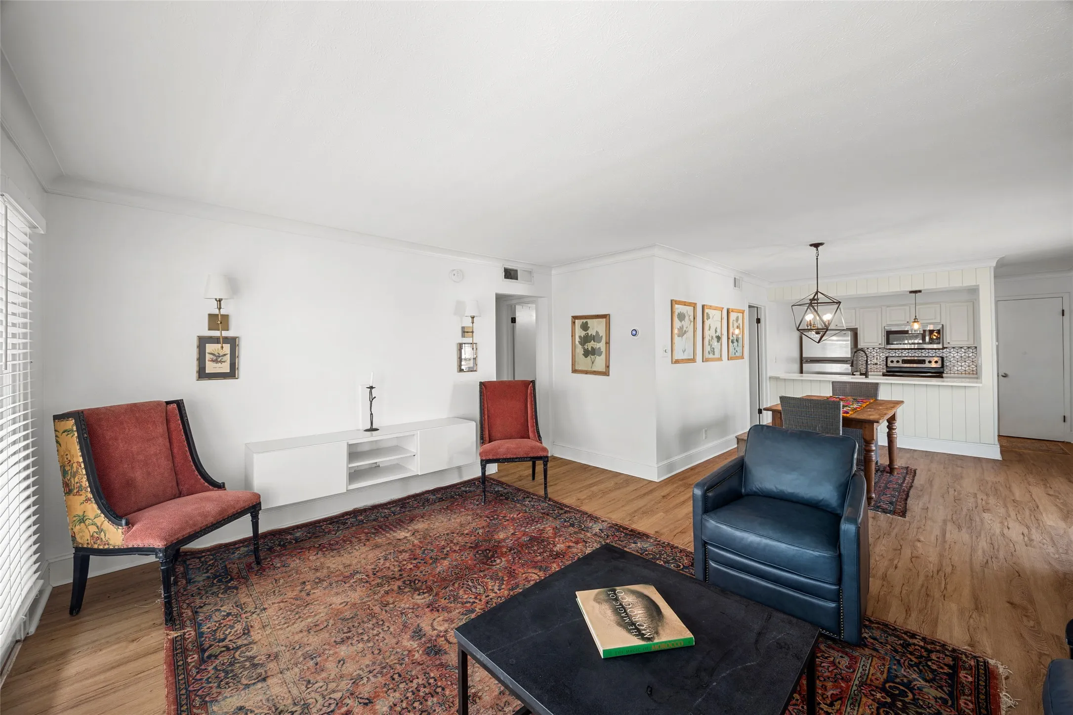 Living room with double doors out to balcony