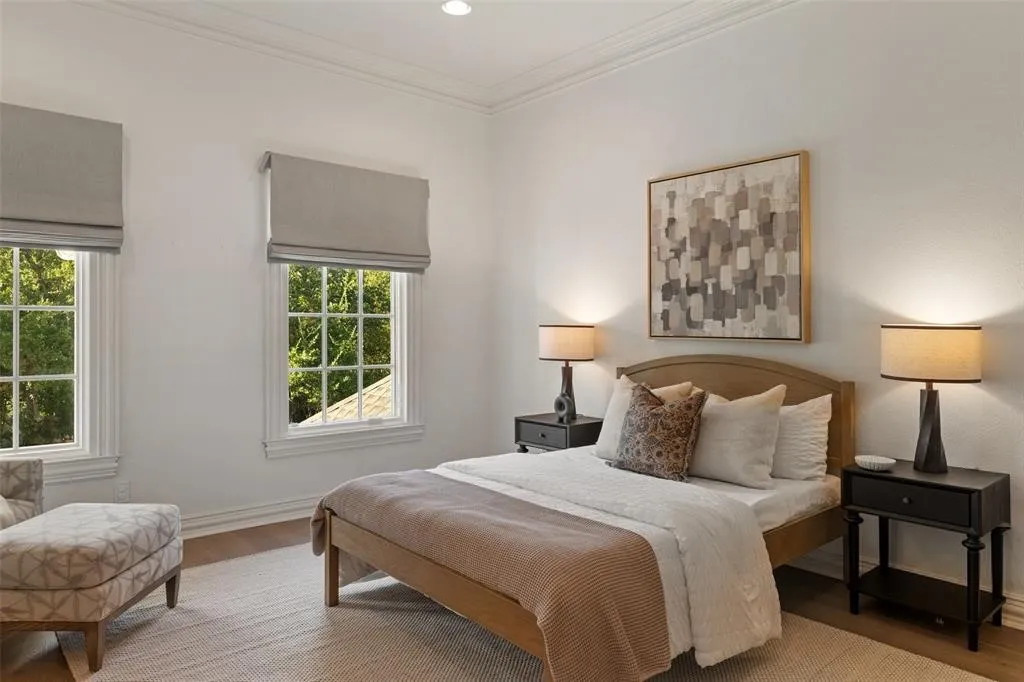 Dual sash windows with Roman shades