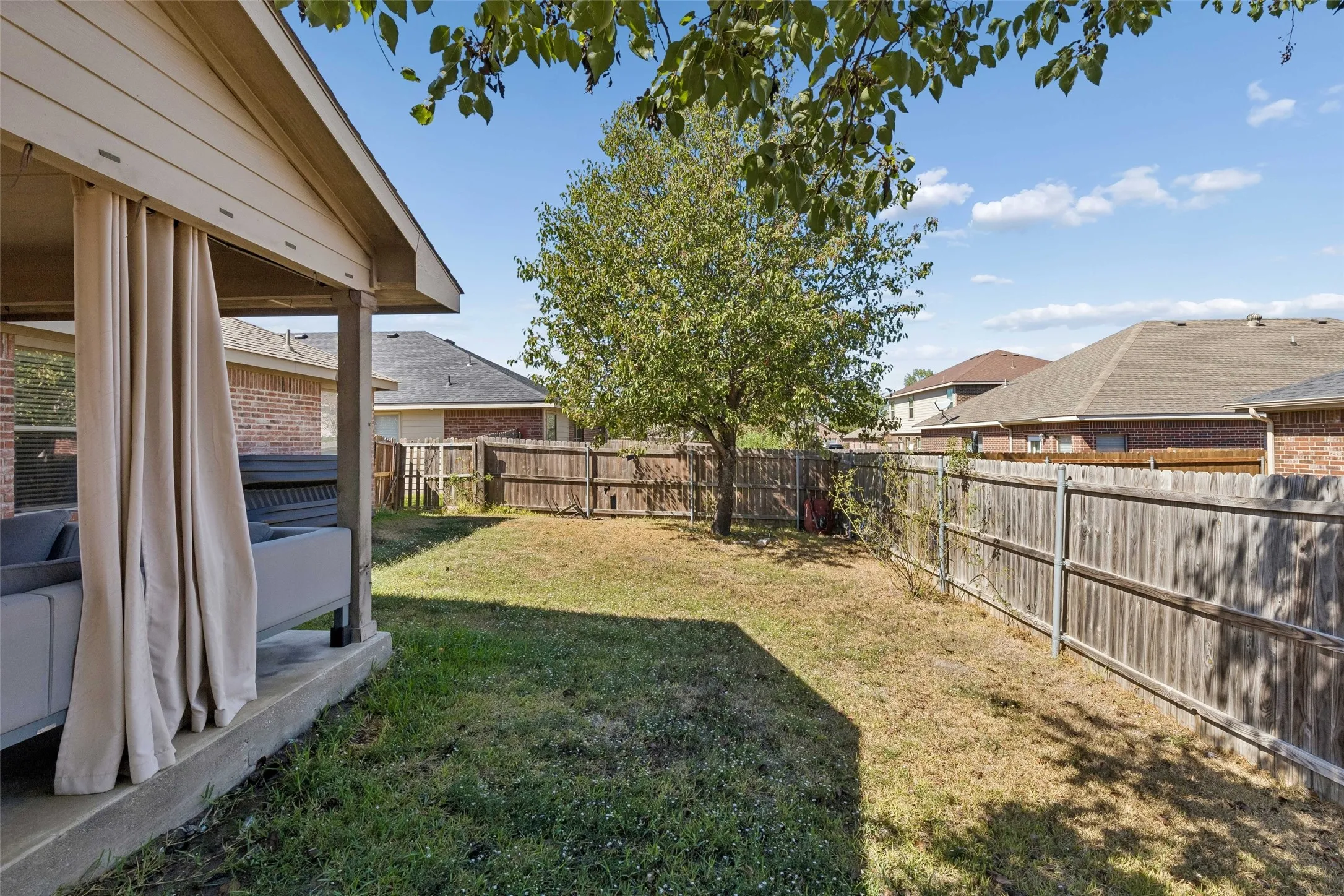 Covered patio with concrete flooring