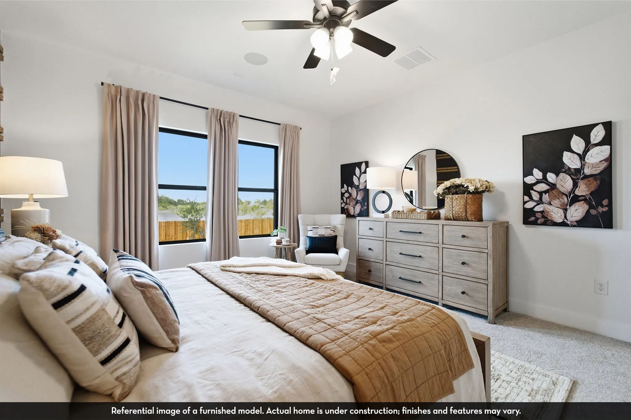 Carpeted flooring, white painted walls, a ceiling fan with integrated lighting, and three tall windows with dark frames