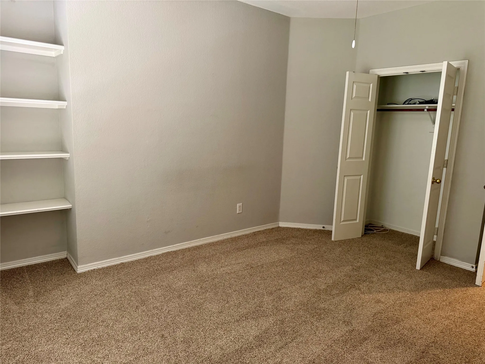 Guest bedroom down can be office with built in shelves
