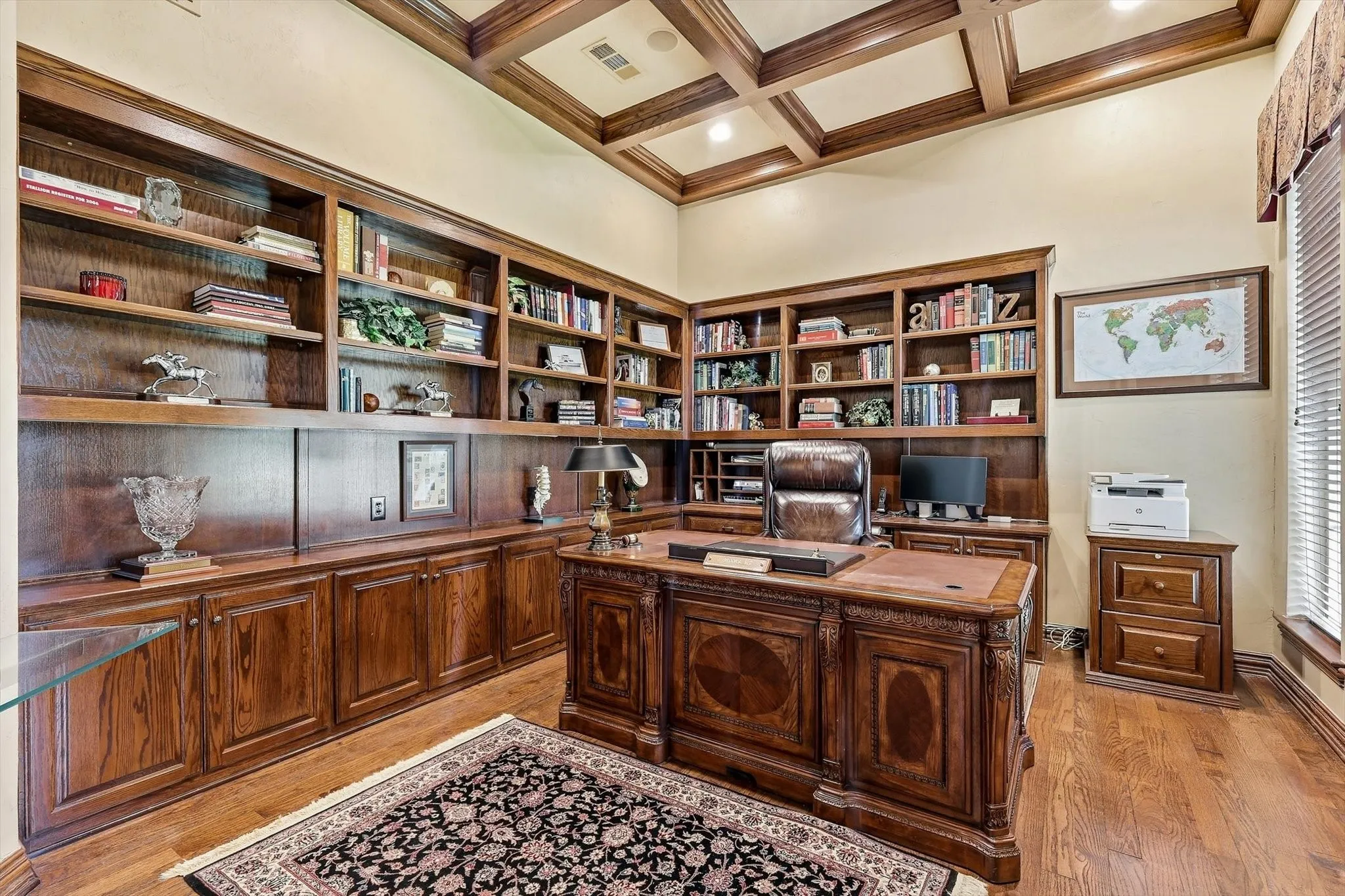 Built ins and beautiful woodwork on the ceiling.  Sits at the front of the home.