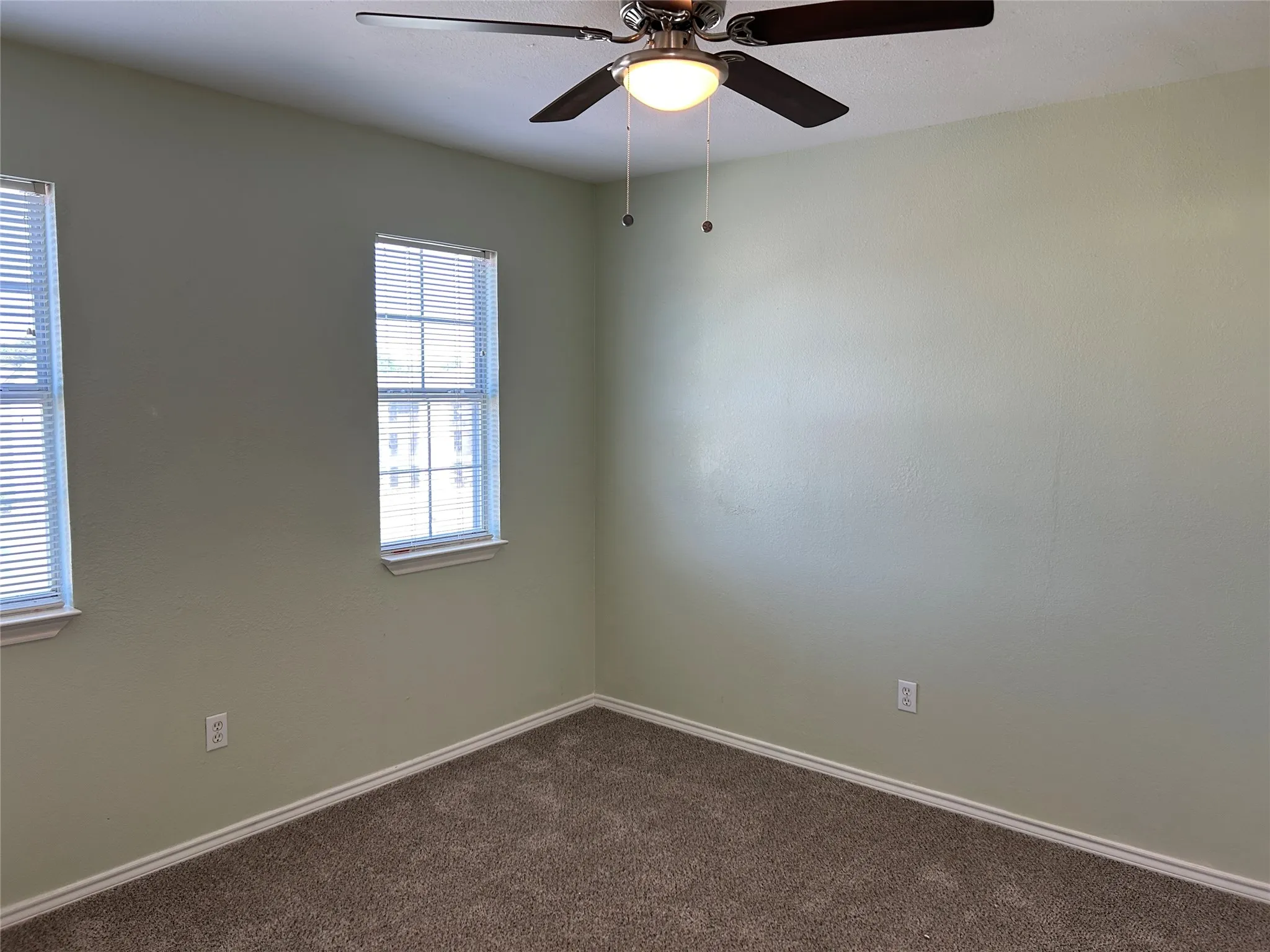 Secondary bedroom with plenty of natural light.