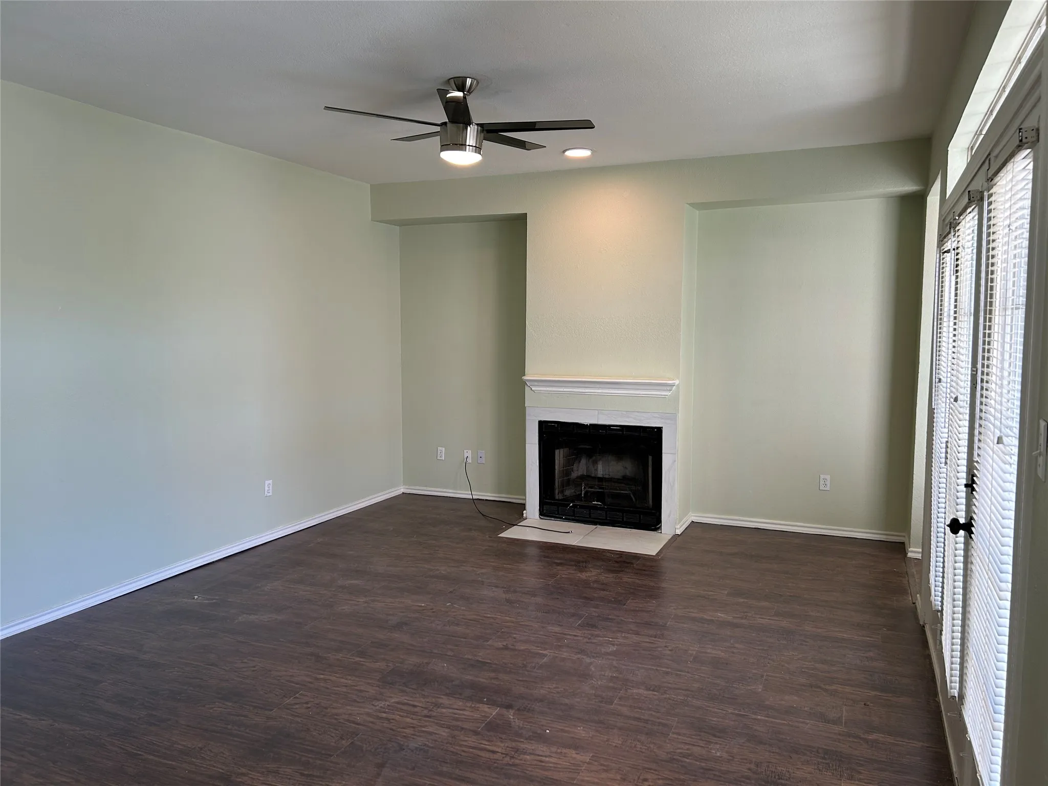 Living room with fireplace for chilly nights.