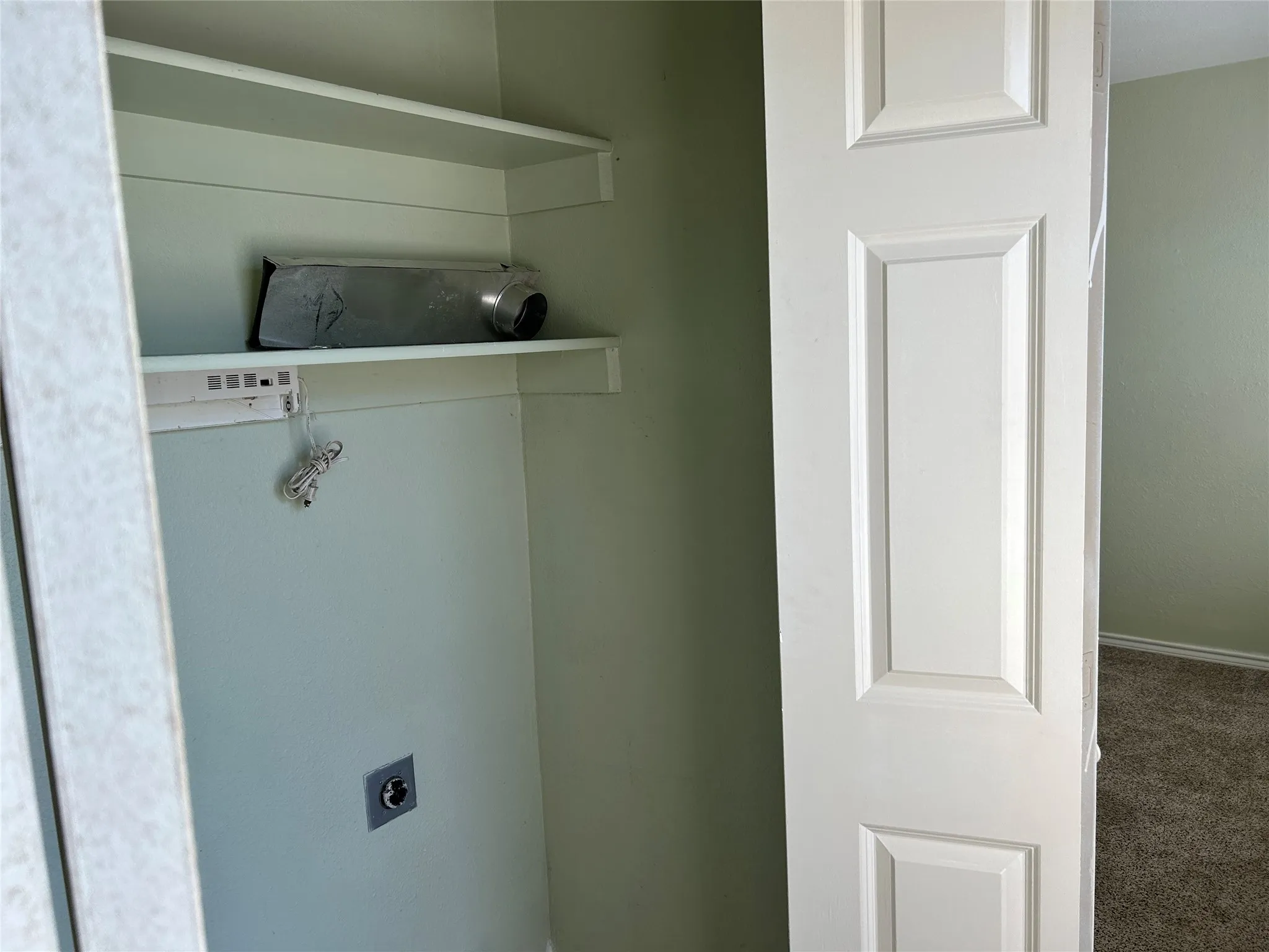 Utility is on the second level.  Plenty of space for a full-sized washer and dryer.