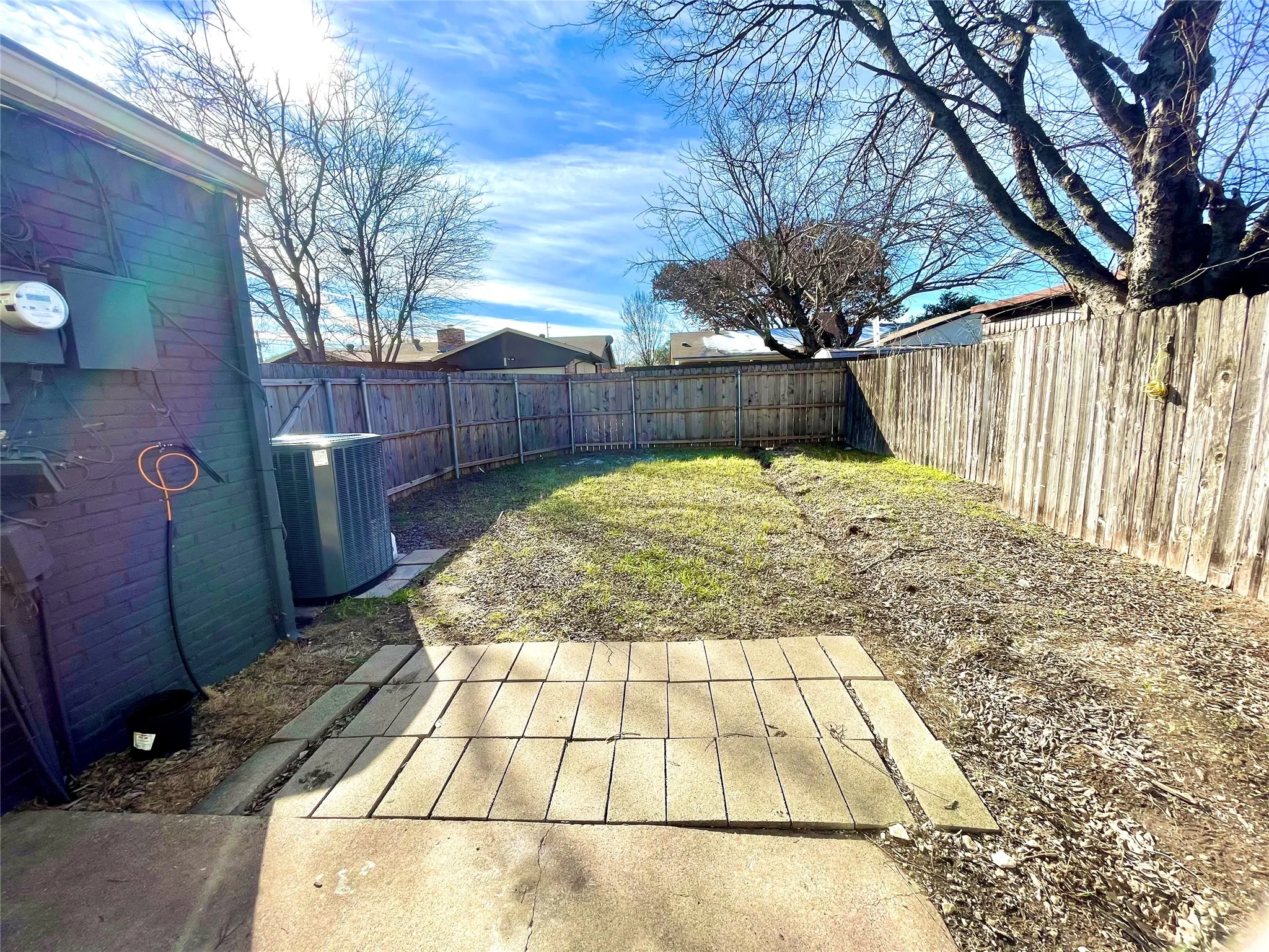View of yard featuring a patio area and cooling unit
