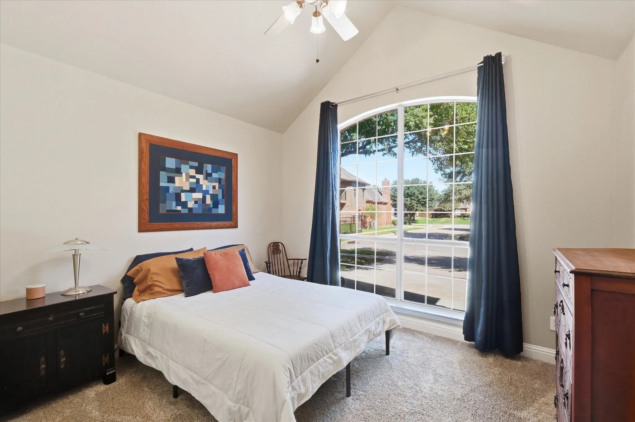 BR 2 is spacious & bright with high ceiling & fan.