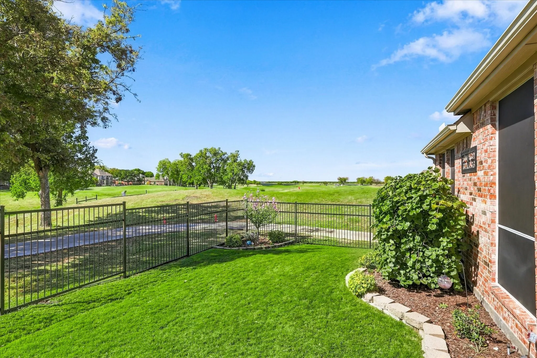 This corner lot on the 6th green has trail access & sunset views over the lake all year round.