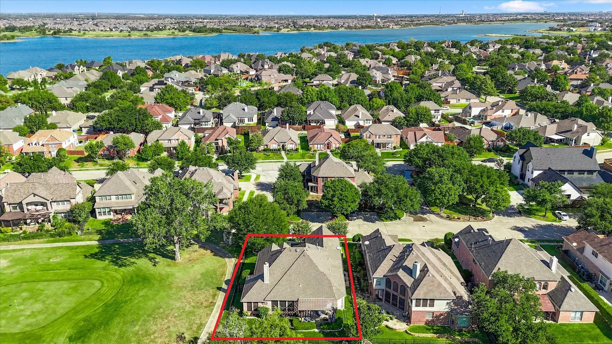 This corner lot on the 6th green has trail access & sunset views over the lake all year round.