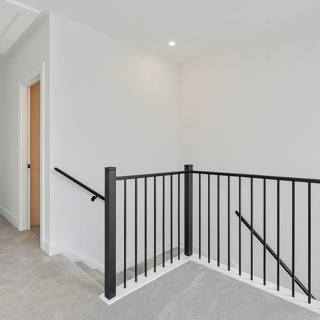 White walls with recessed lighting and crown molding
