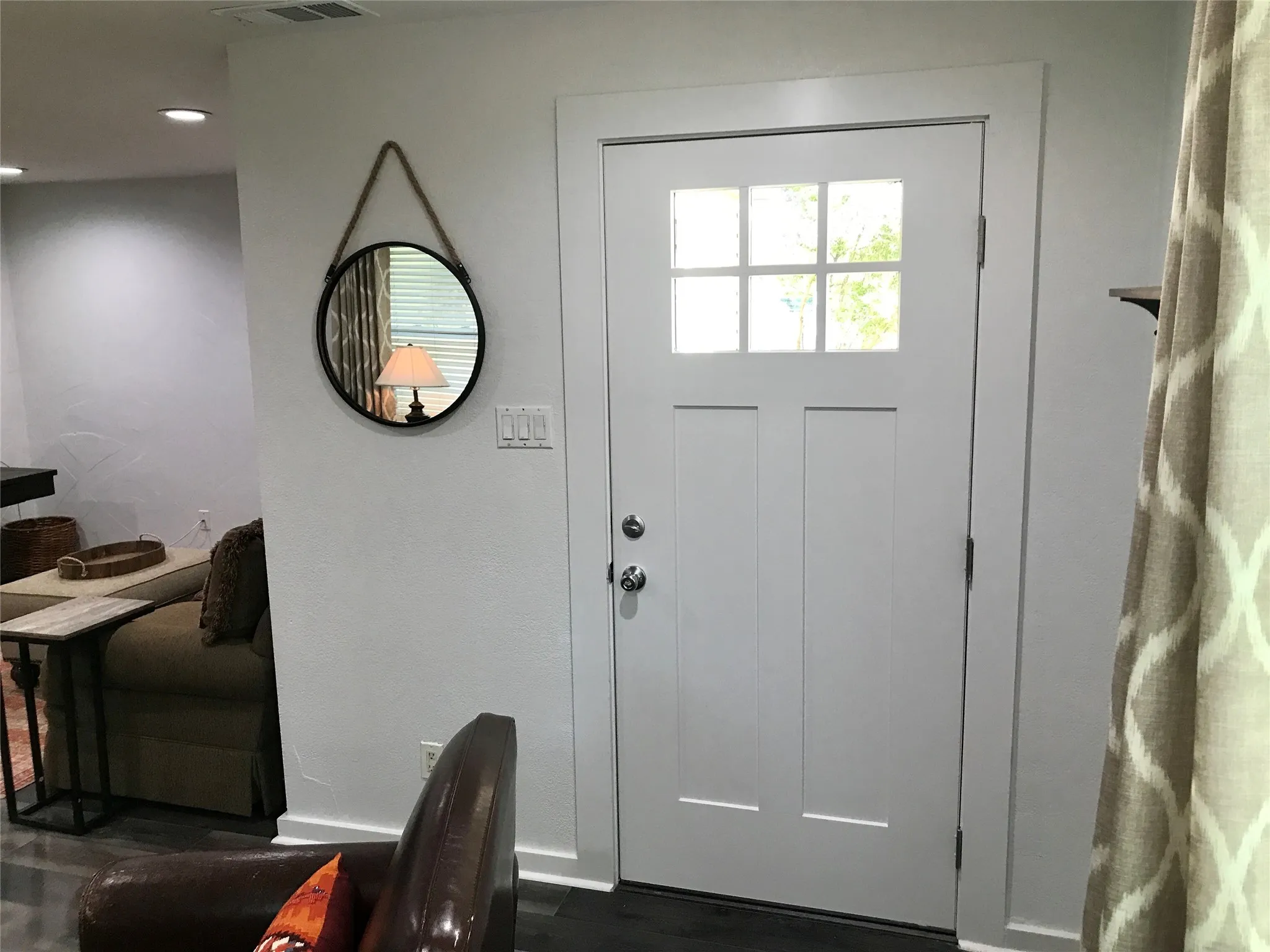 White entry door with divided lite window