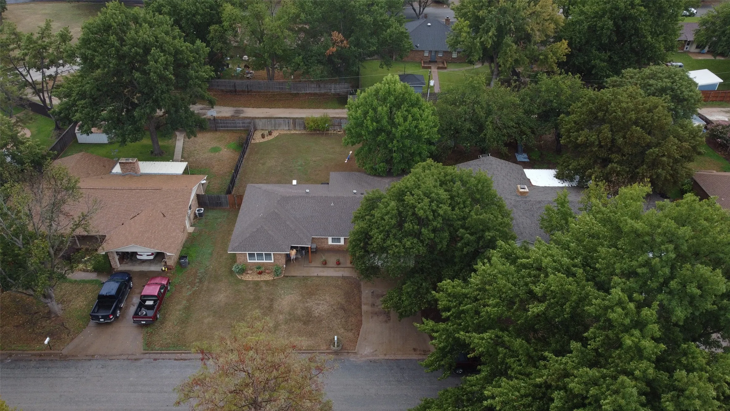 Single-story residence with a gabled roof and attached carport