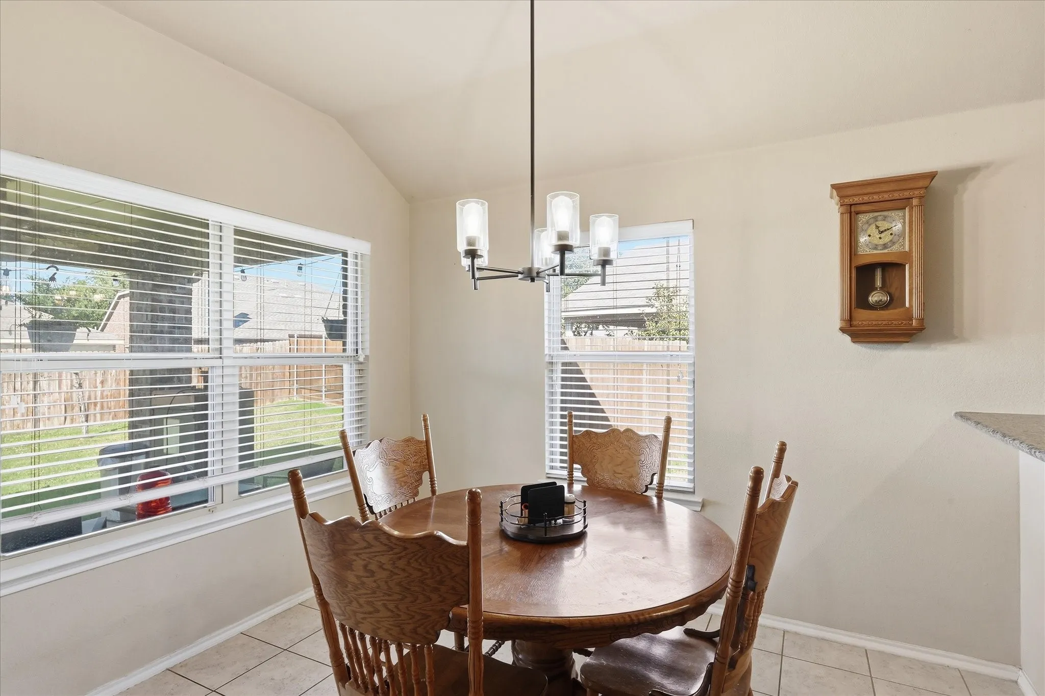 Take a look at this spacious eating area.  Enjoy the view and maybe some bird watching, or ability to watch the kids outside.