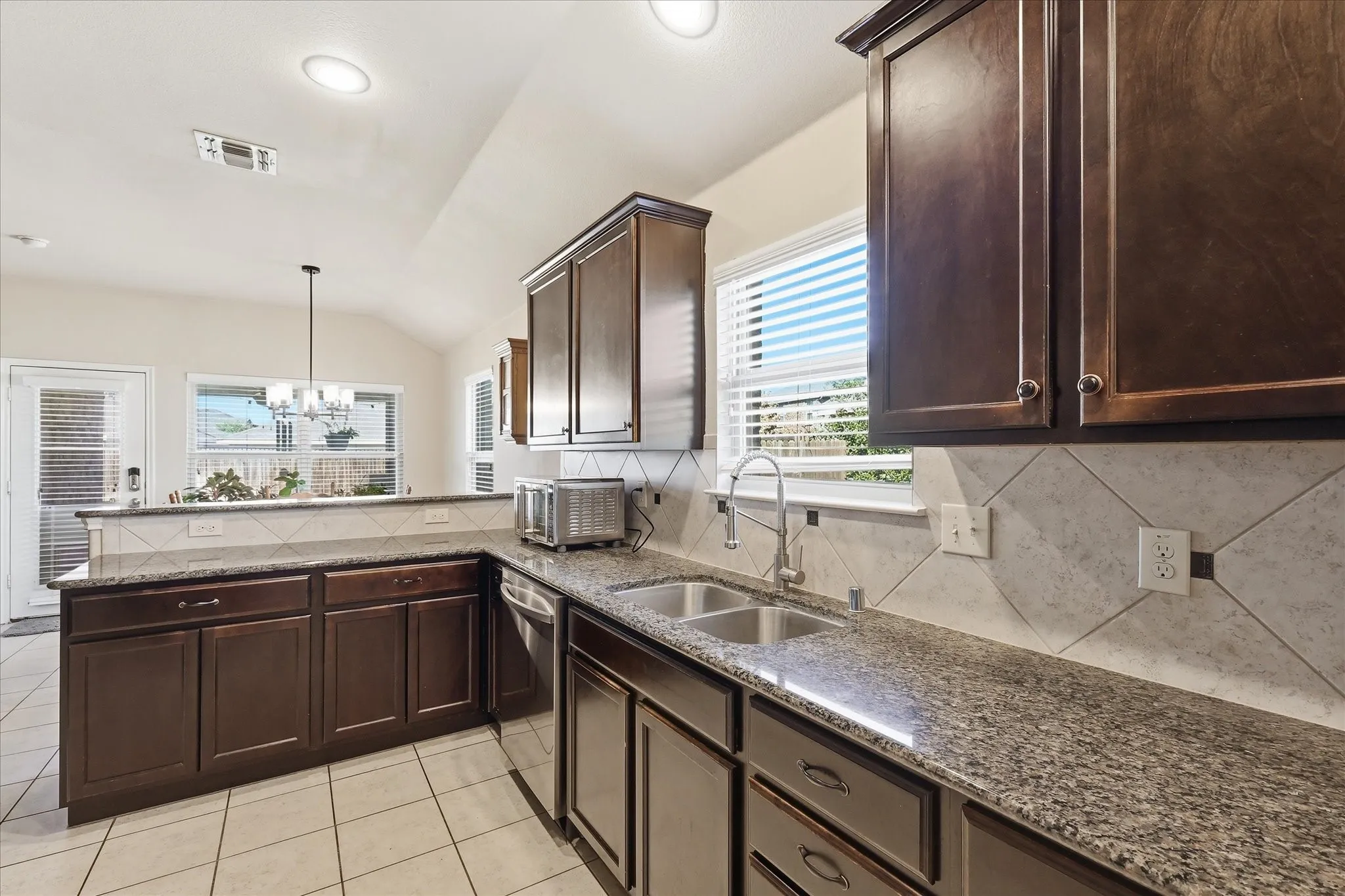Love this floorplan. So much natural light.  Can be in the kitchen baking and cooking and still be connected to the family in other room areas.