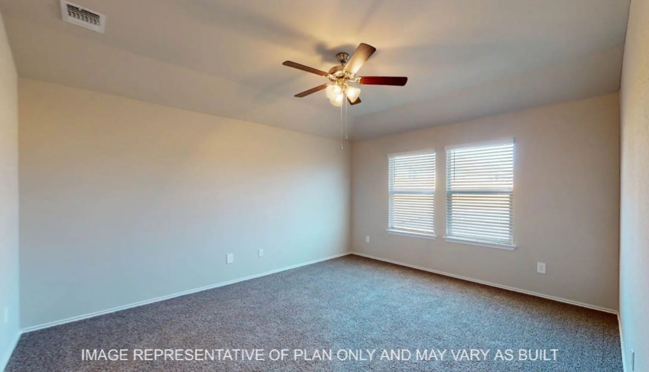 Neutral tone wall finishes, carpeting, and a ceiling fan with integrated lighting