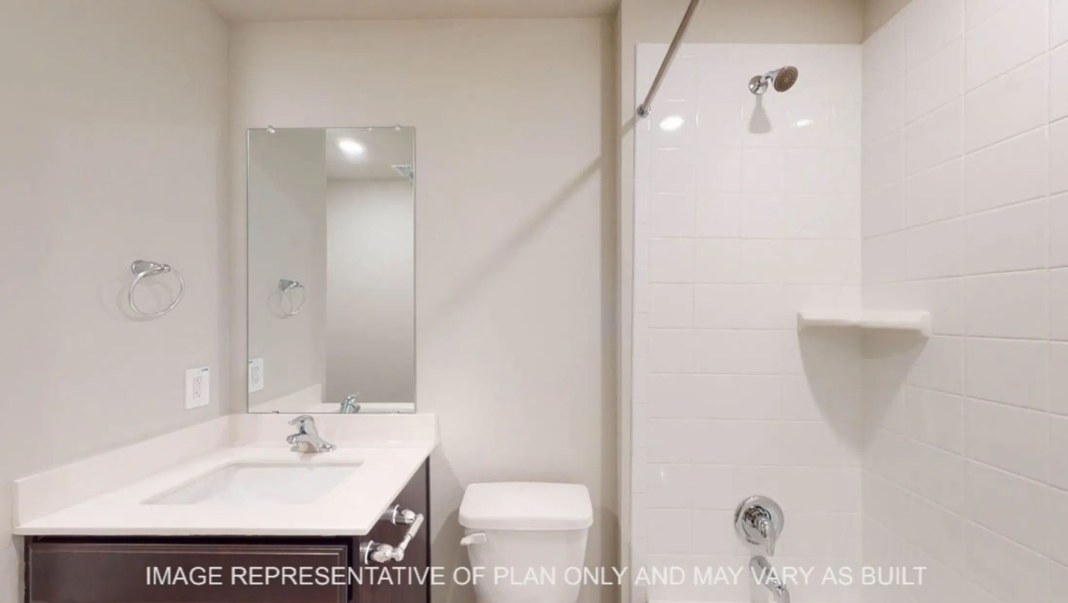 Single vanity with an integrated sink, polished chrome faucet, and dark wood-finish cabinetry