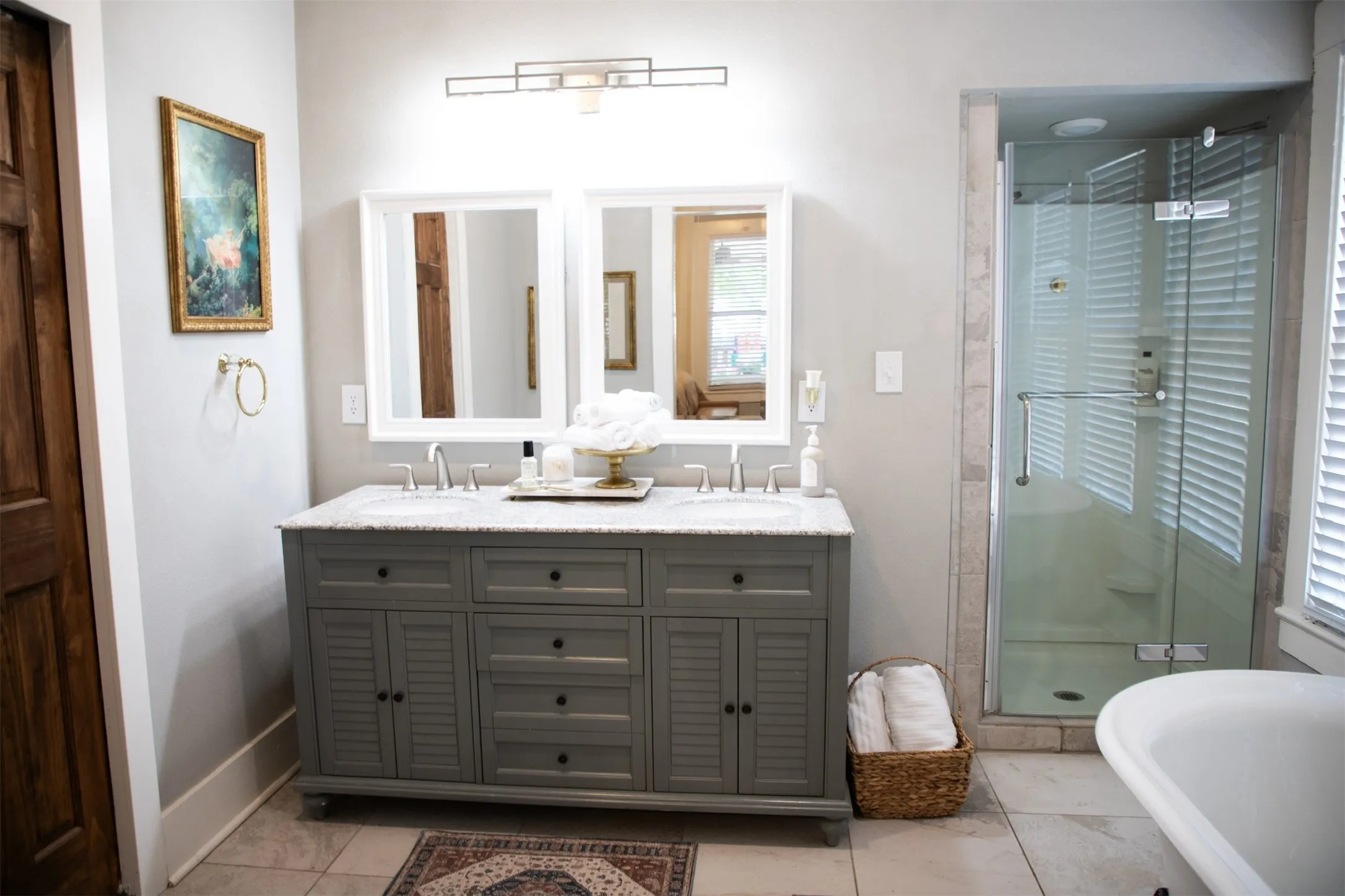 Double vanity with undermount sinks and a light-colored countertop