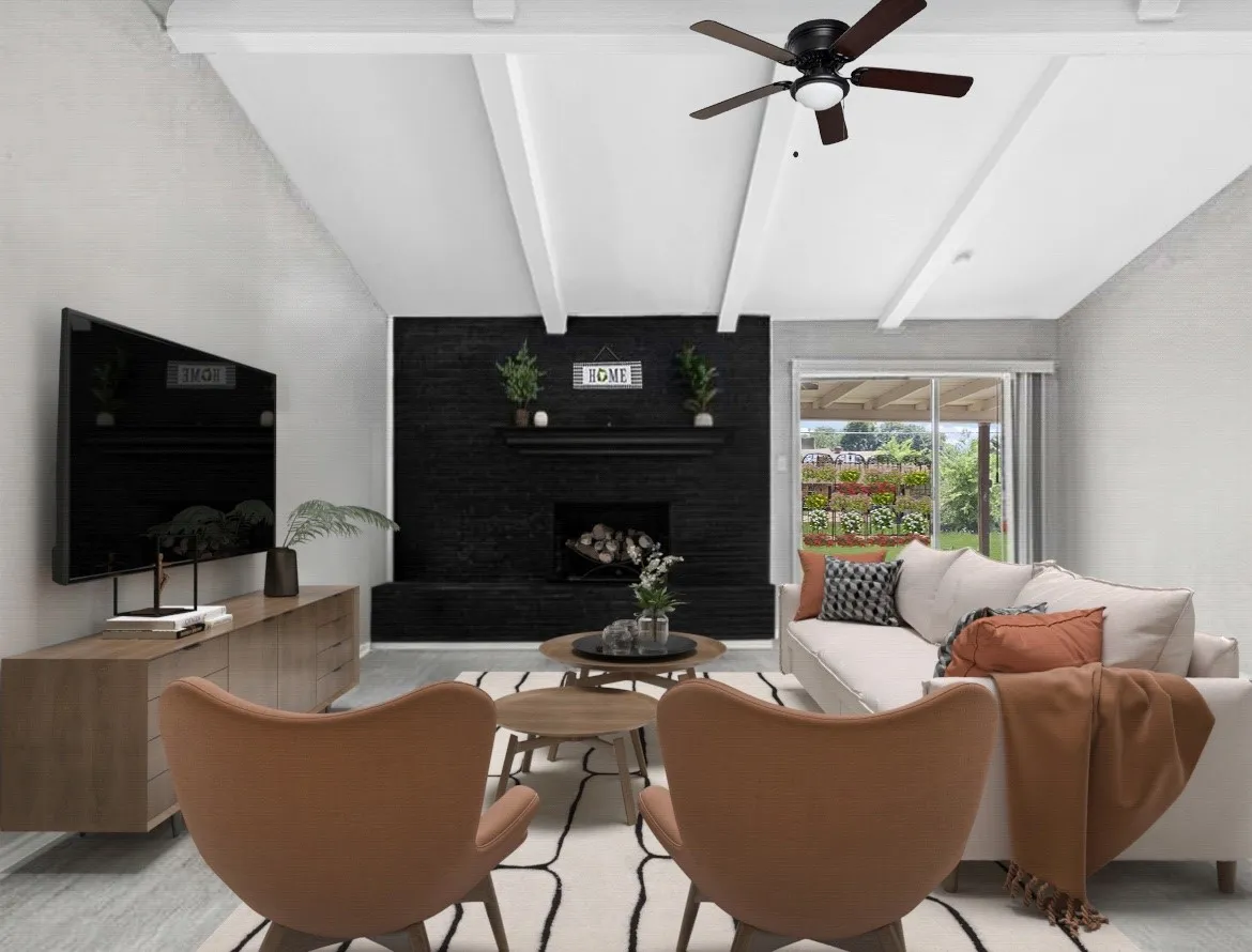 Vaulted ceiling with exposed beams, ceiling fan, black brick fireplace with mantel, wood-finish media console, and sliding glass door