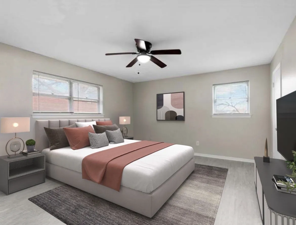 Recessed lighting, wood-finish flooring, ceiling fan with integrated lighting, multiple windows with blinds, and  light-toned walls