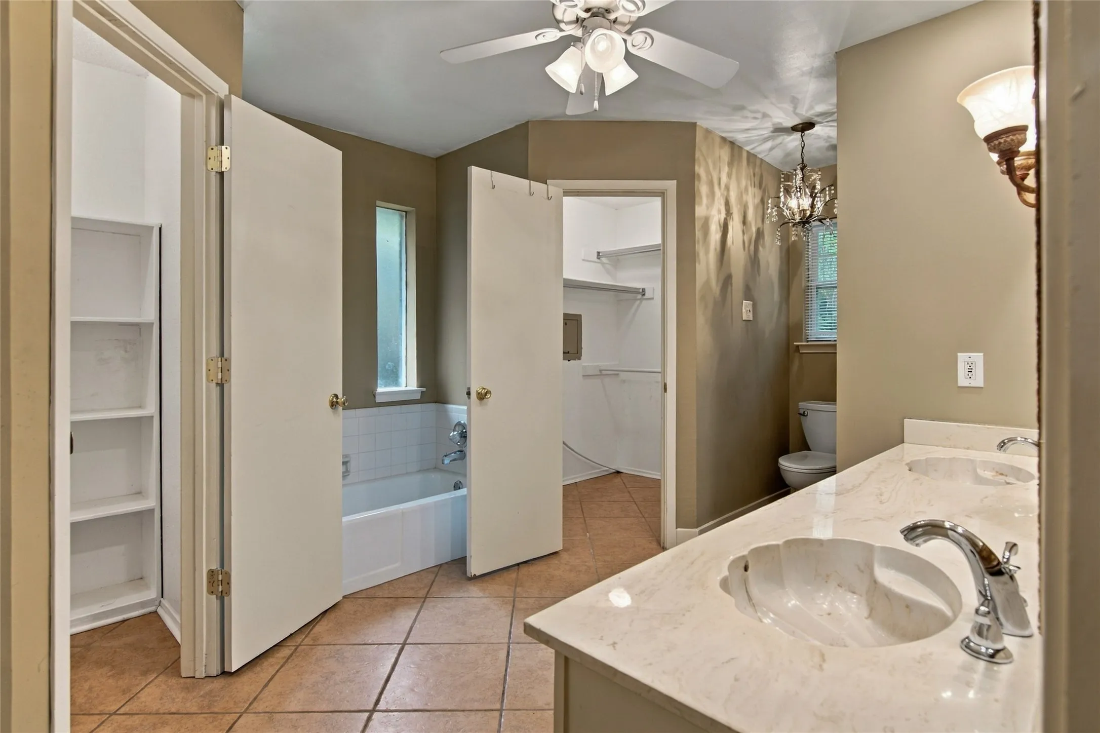 Double vanity, separate tub and 2 walk in closets
