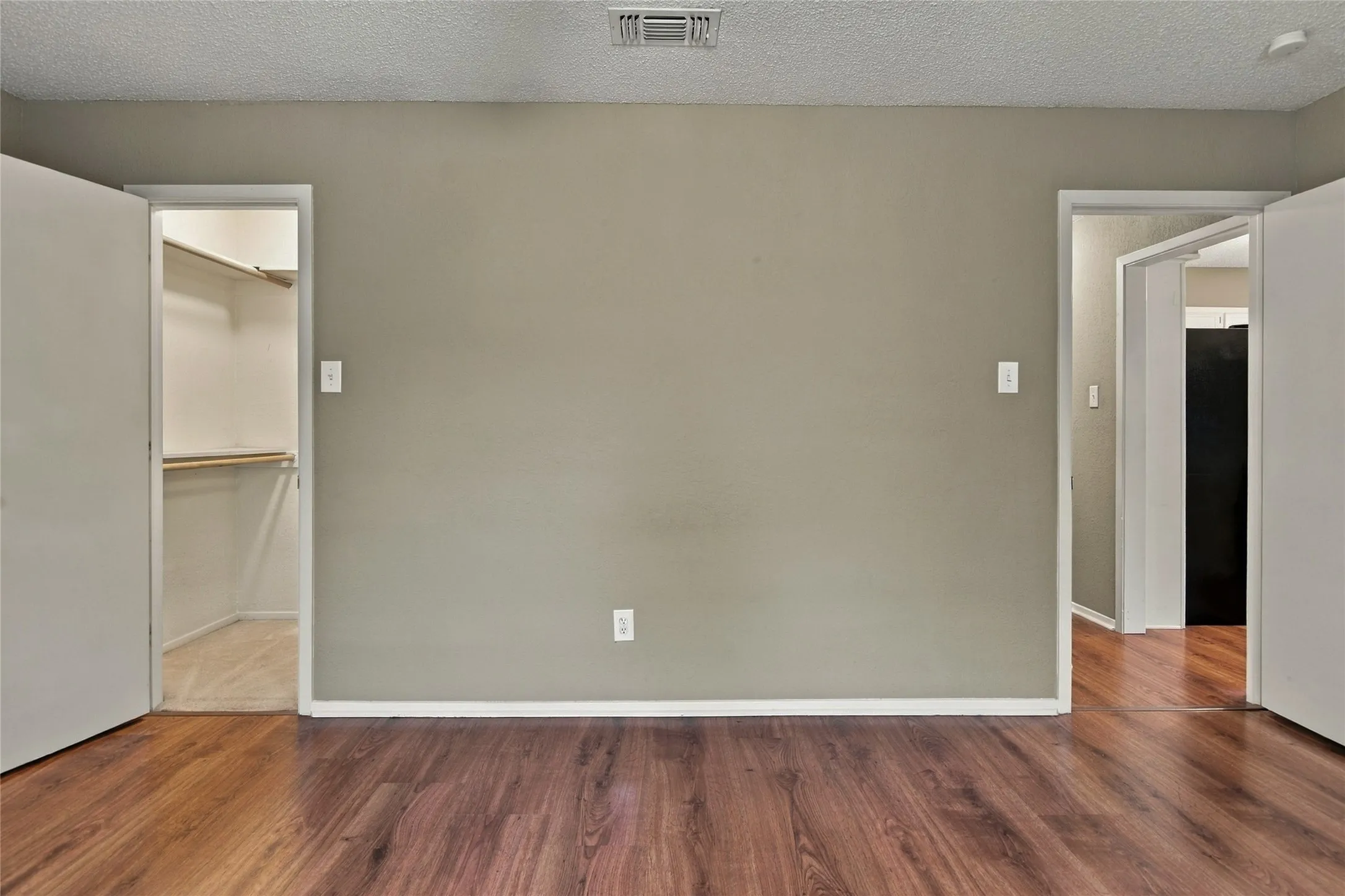 LVP flooring throughout, light grey wall paint, and white trim