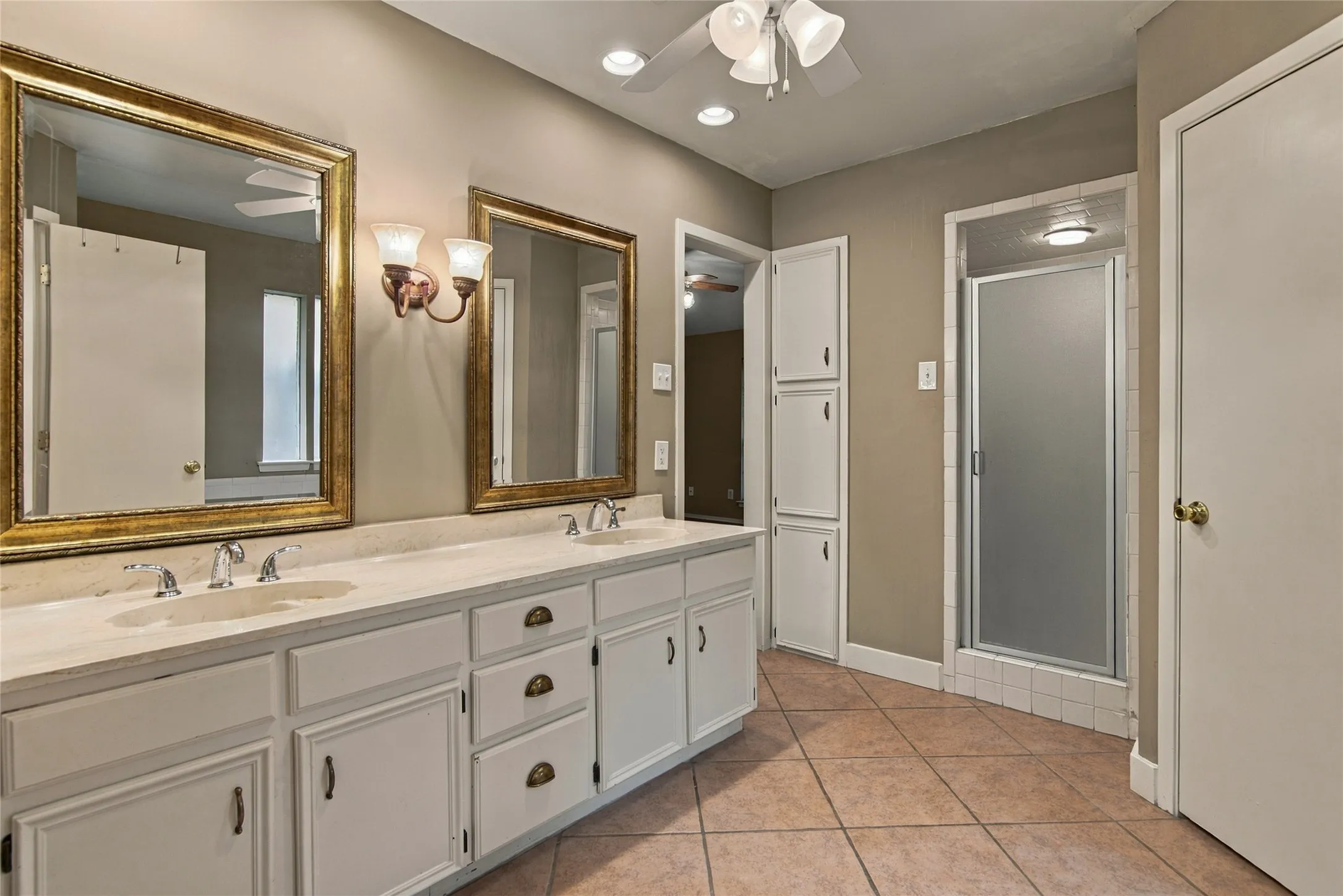 Separate shower and linen storage