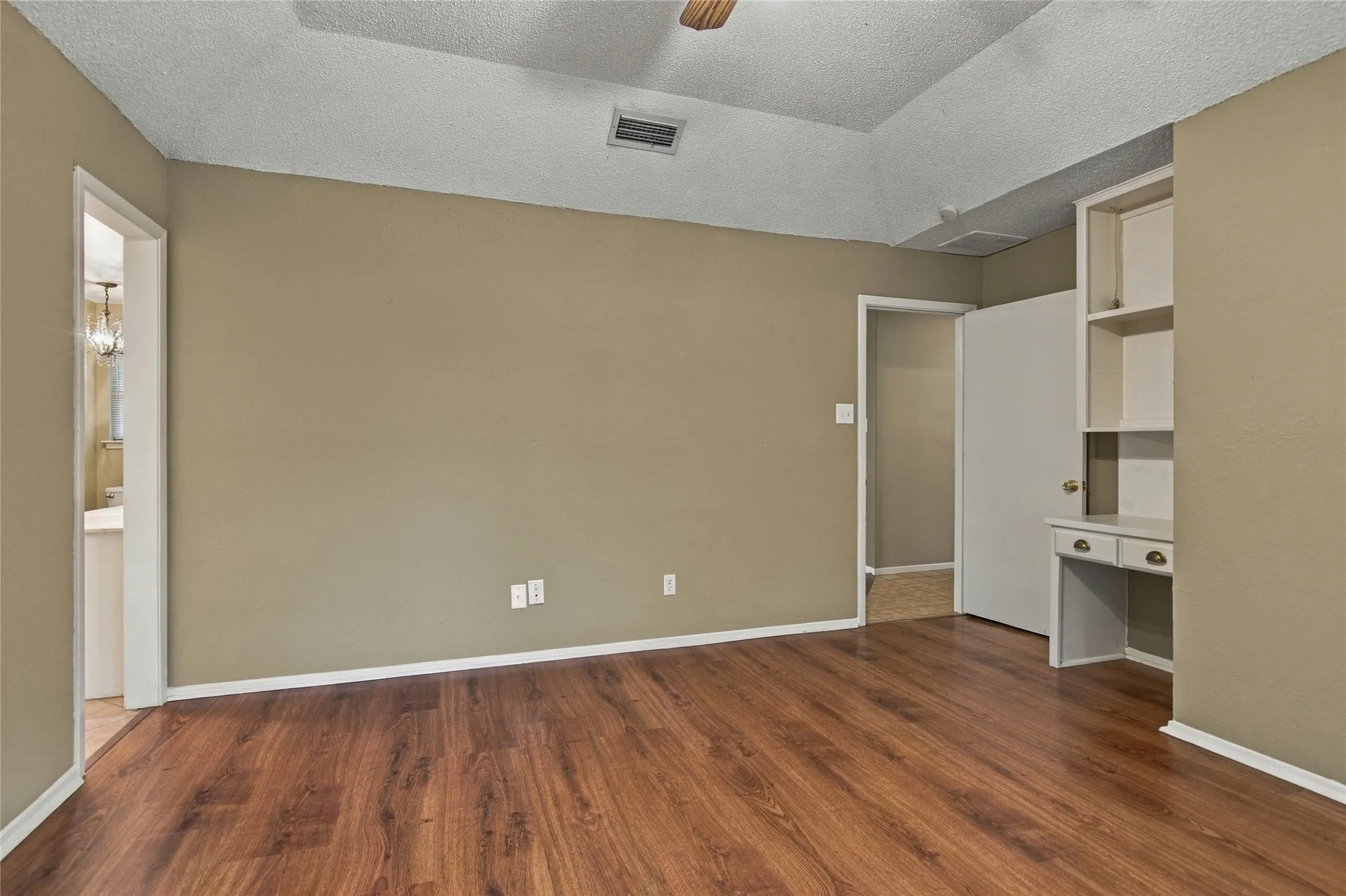 Built-in desk and cove ceiling