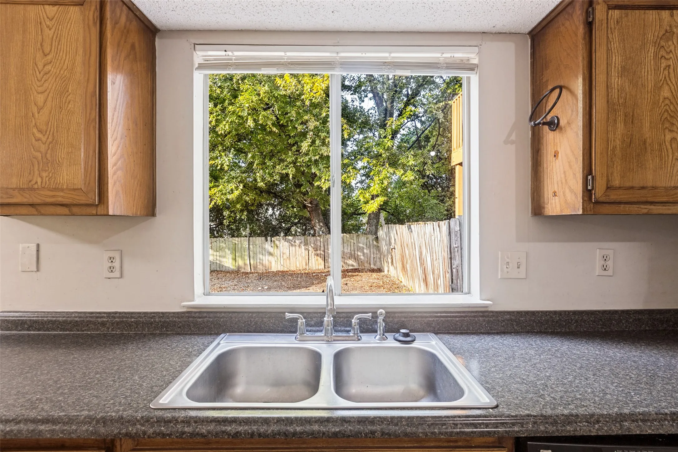 Double basin stainless steel sink with a chrome faucet
