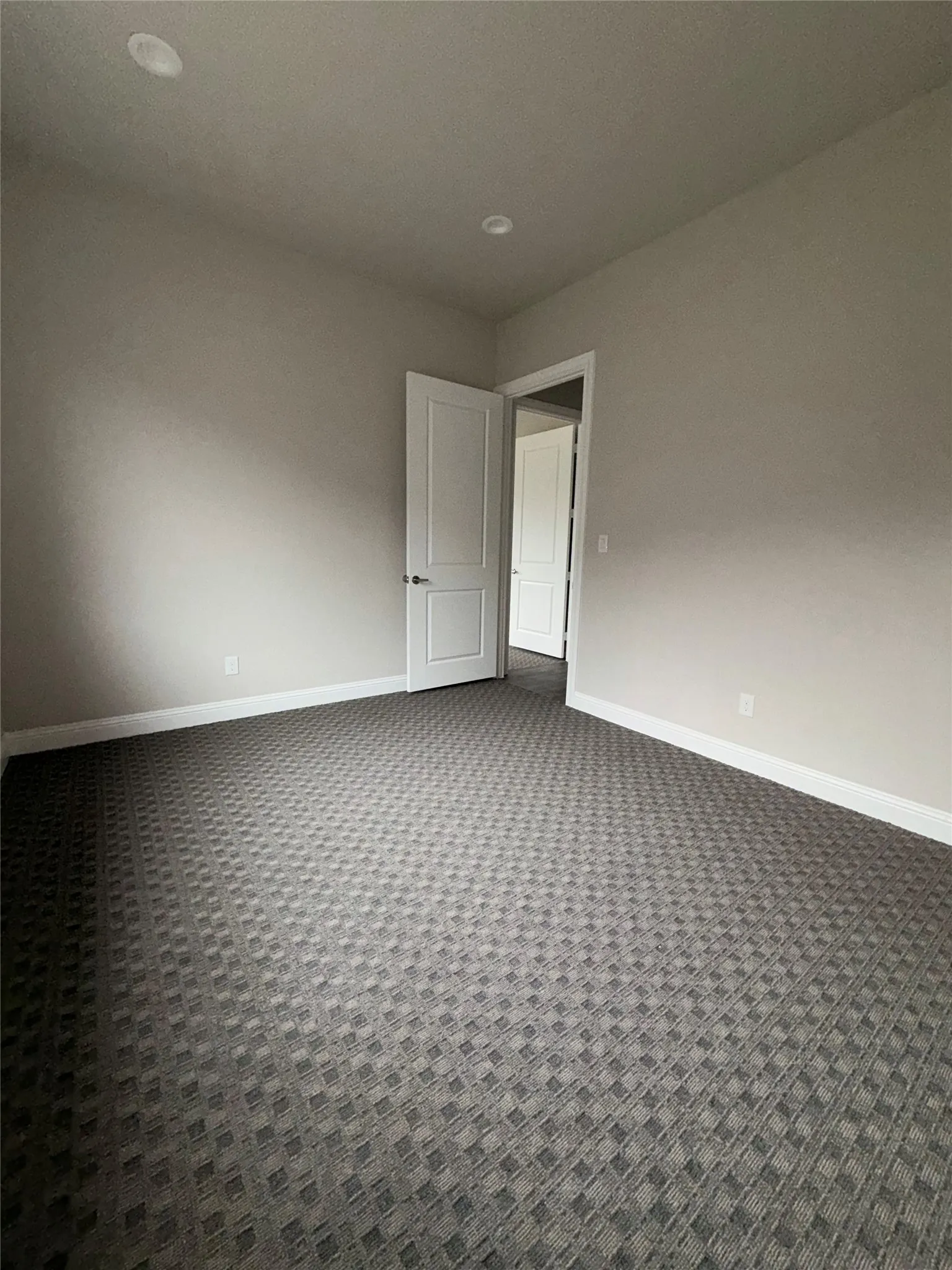 Recessed ceiling lighting with a neutral wall palette