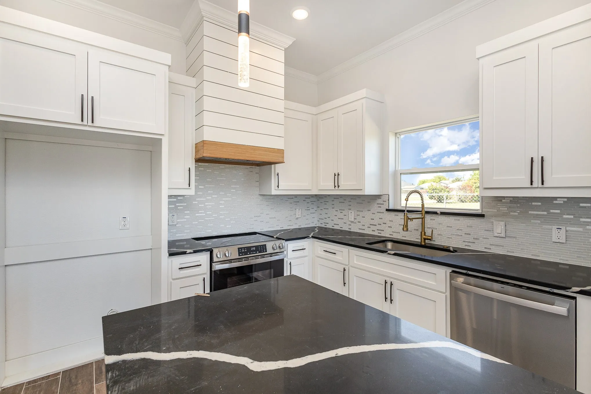 Lovely kitchen window directly over sink.