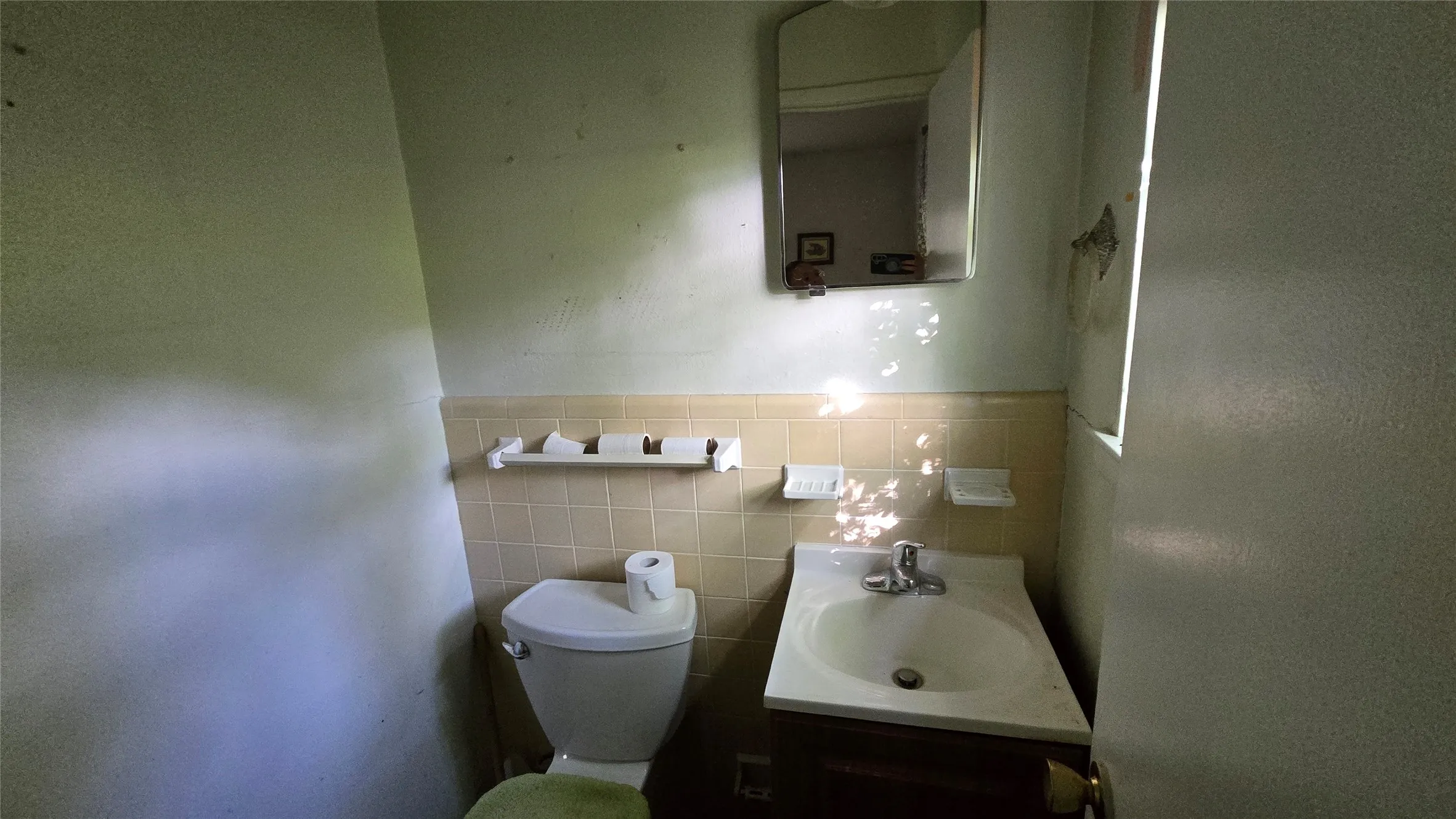 Half bathroom attached to bedroom