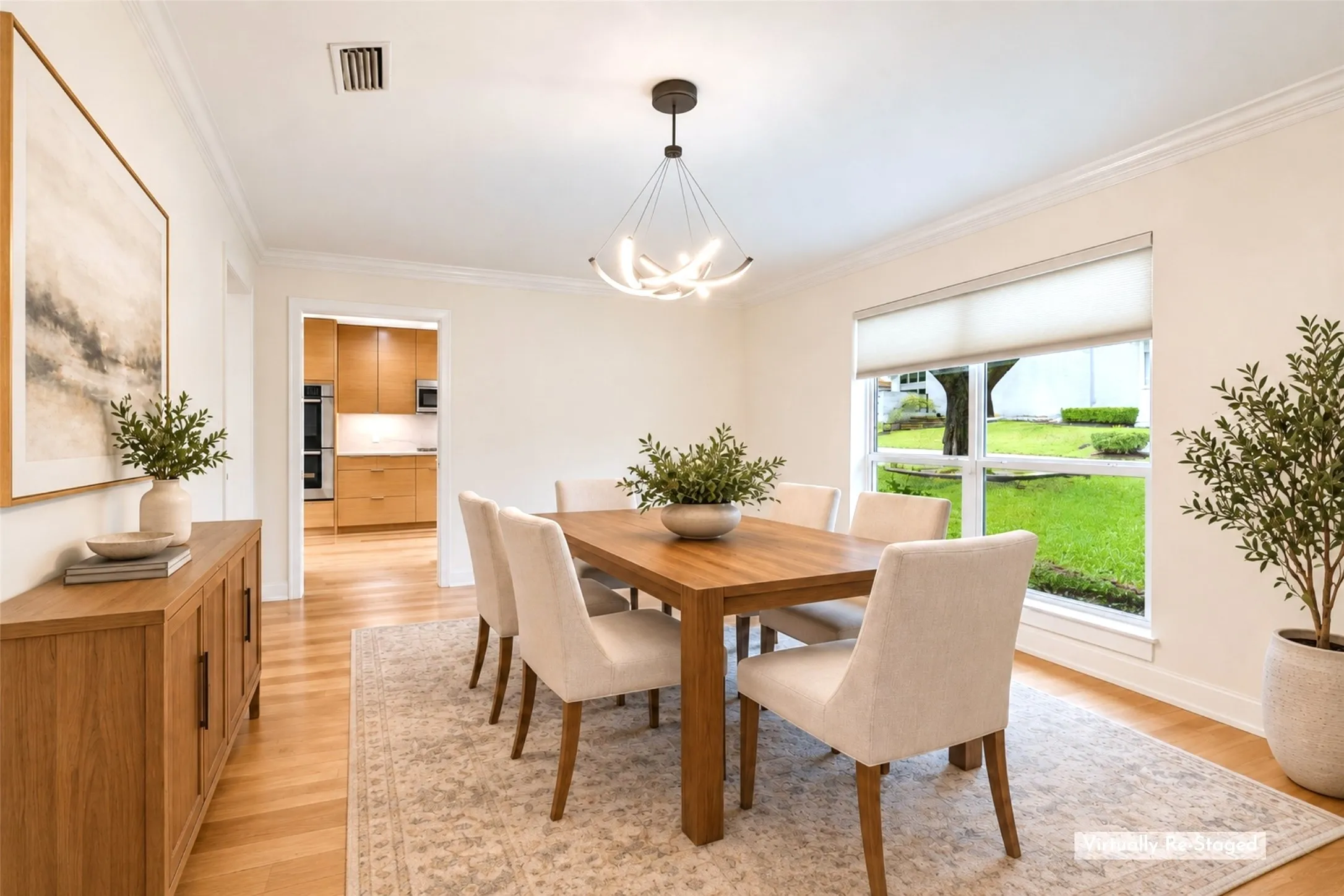 Dining with a Direct Kitchen Connection — This well-proportioned dining room sits just steps from the remodeled kitchen, creating an effortless setup for everyday meals, entertaining, and holiday gatherings.