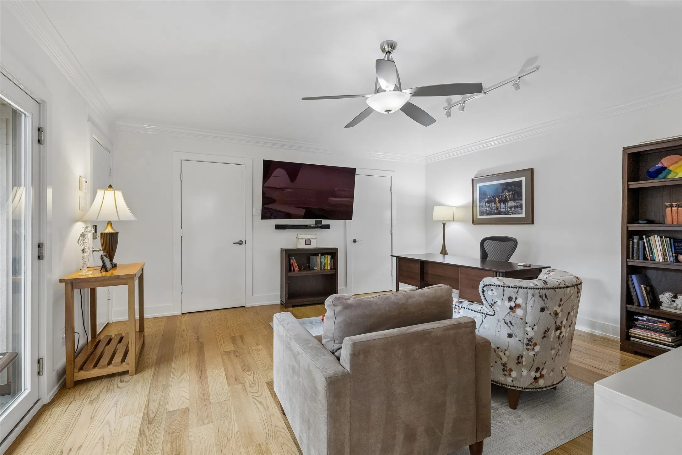 Positioned just off the main living areas, this flexible space offers a comfortable degree of privacy while remaining connected to the rest of the home.