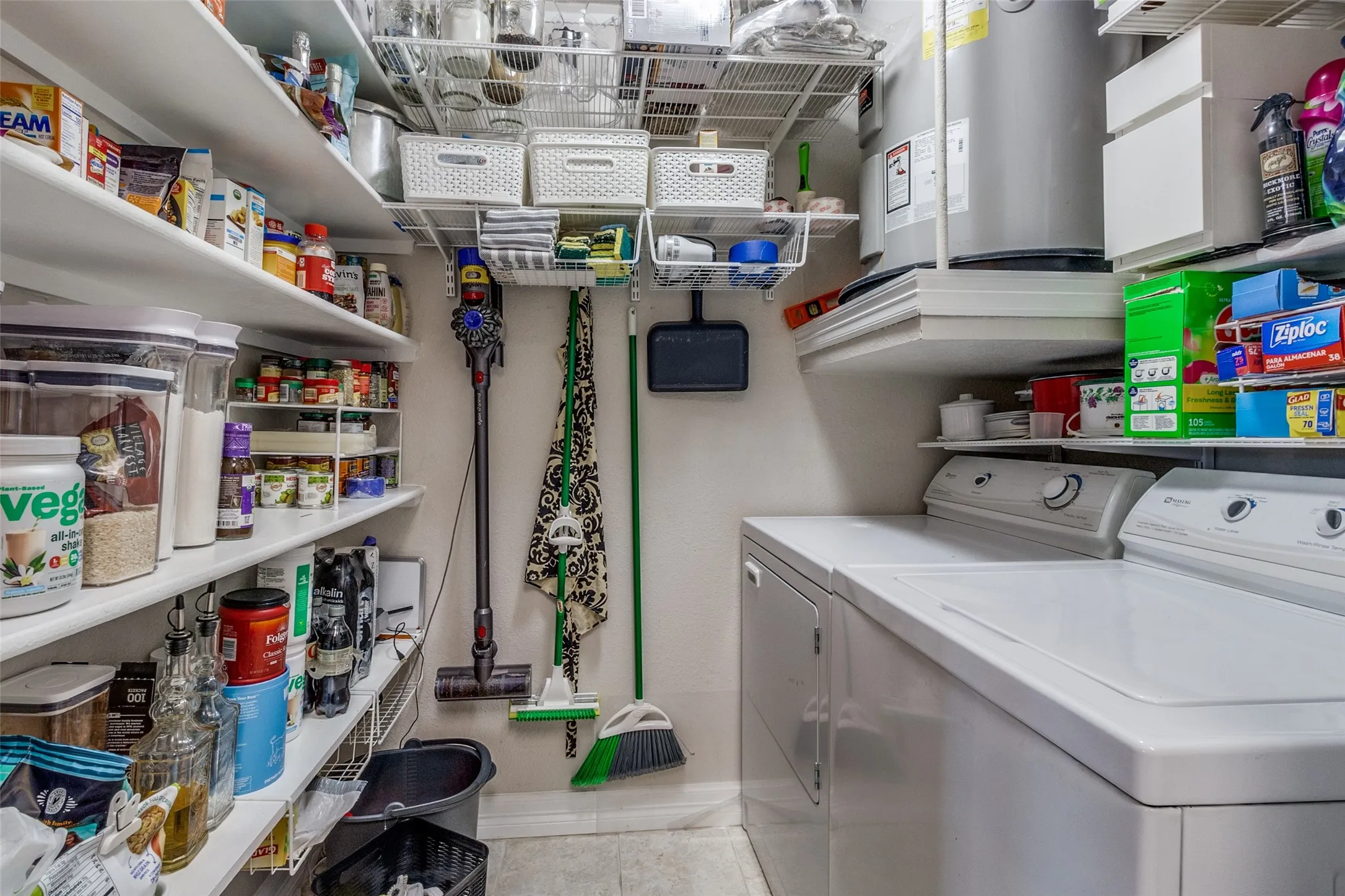 Dedicated laundry room & large pantry