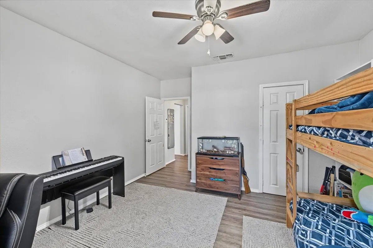 Wood-finish flooring with light-toned walls
