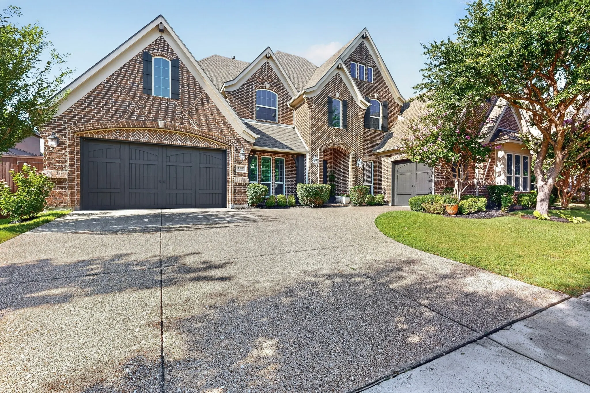 Traditional brick exterior with gabled rooflines